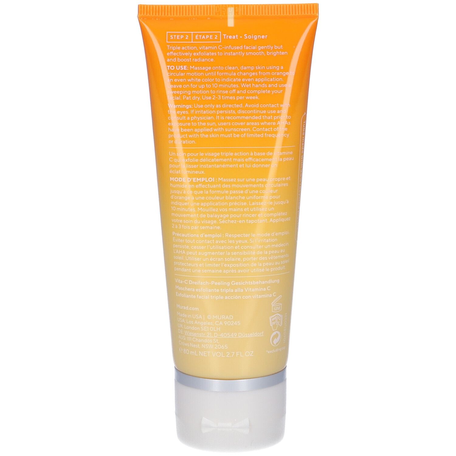 Retro del tubo. Testo in più lingue. Sfondo principalmente giallo.