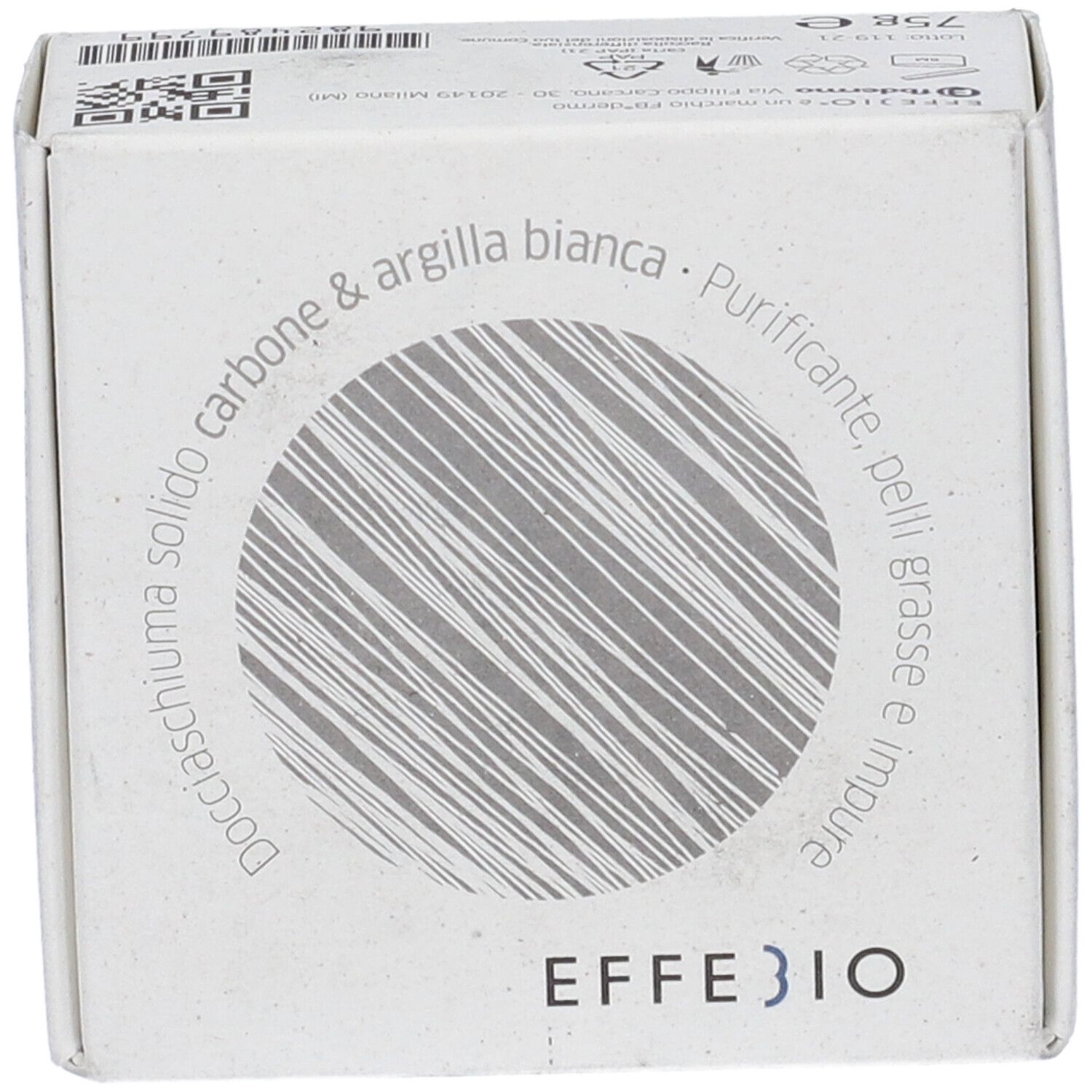 Confezione in cartone con informazioni sul prodotto. Scritta: Effebio, Docciaschiuma Solido Carbone & Argilla Bianca. Design circolare.