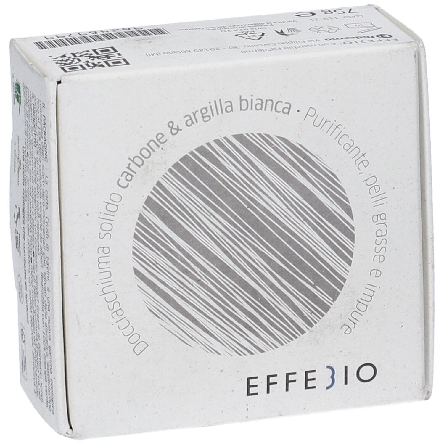 Confezione in cartone con informazioni sul prodotto. Scritta: Effebio, Docciaschiuma Solido Carbone & Argilla Bianca. Design circolare.