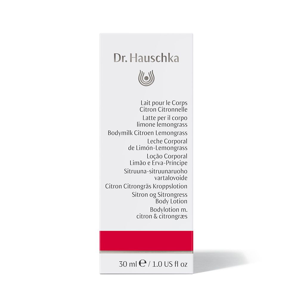 Confezione di cartone con etichetta del prodotto. Scritta: Dr. Hauschka, lozione per il corpo. Striscia rossa in basso.