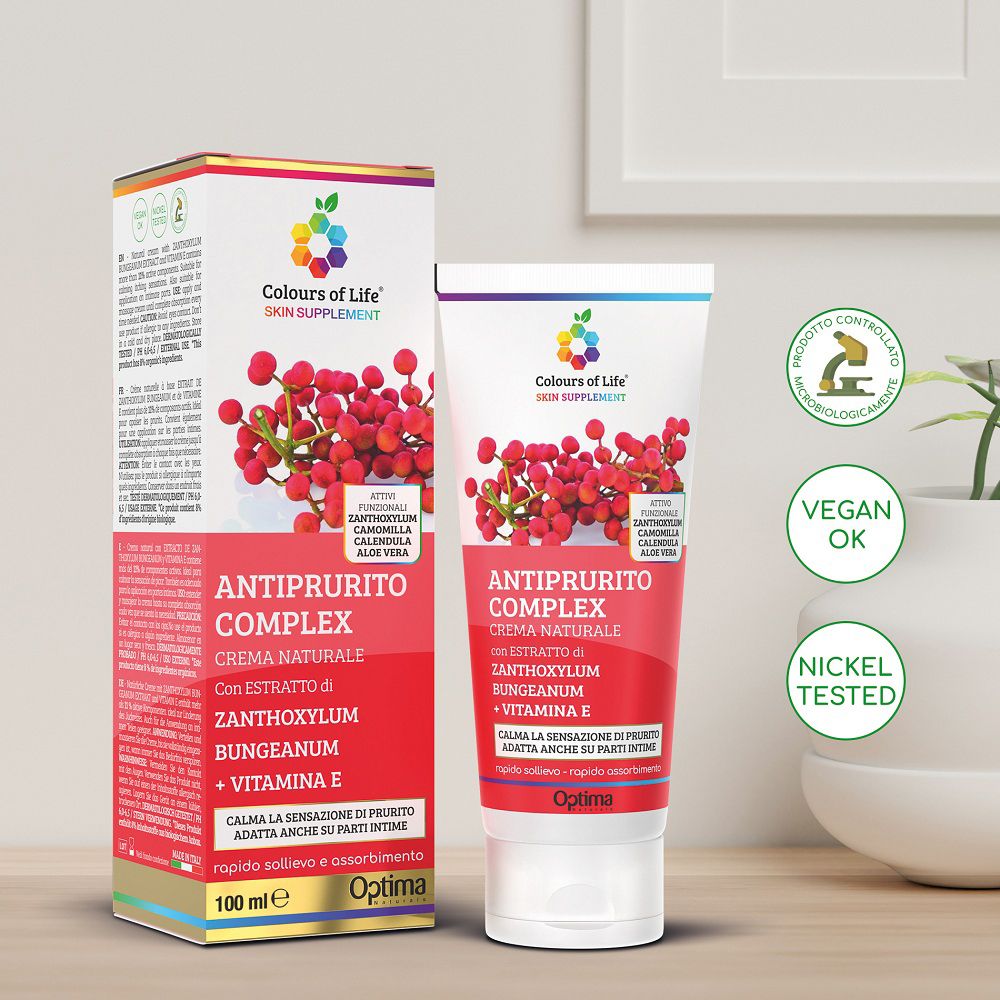 Crema Colours of Life Juckreiz-Komplex con confezione, sigilli e motivo vegetale.