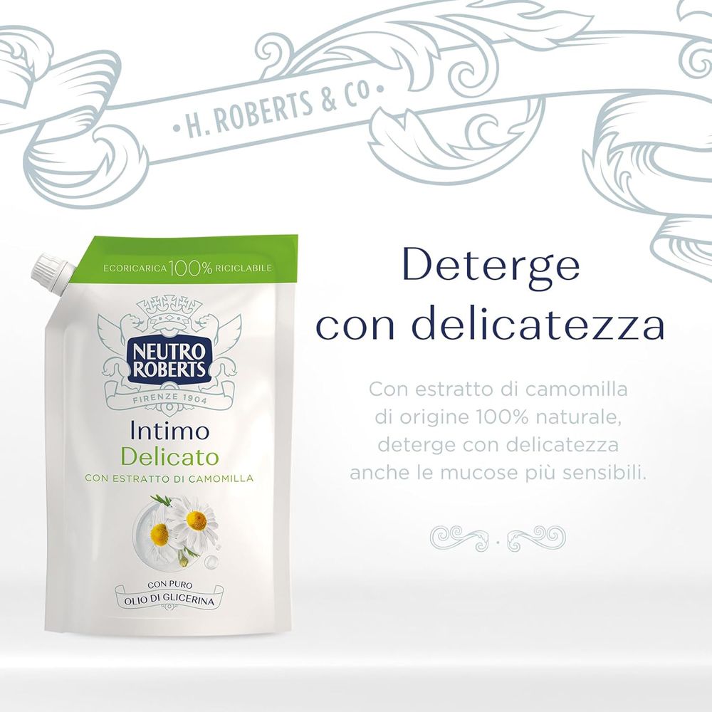 Busta con tappo verde. Testo: Deterge con delicatezza. Illustrazione fiori di camomilla.