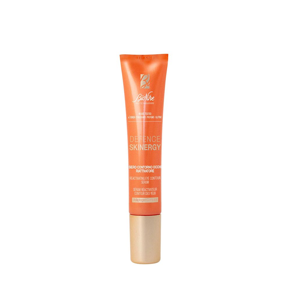 Tubo arancione con tappo dorato. Scritta: Defence Skinergy, siero contorno occhi. Marchio: BioNike.