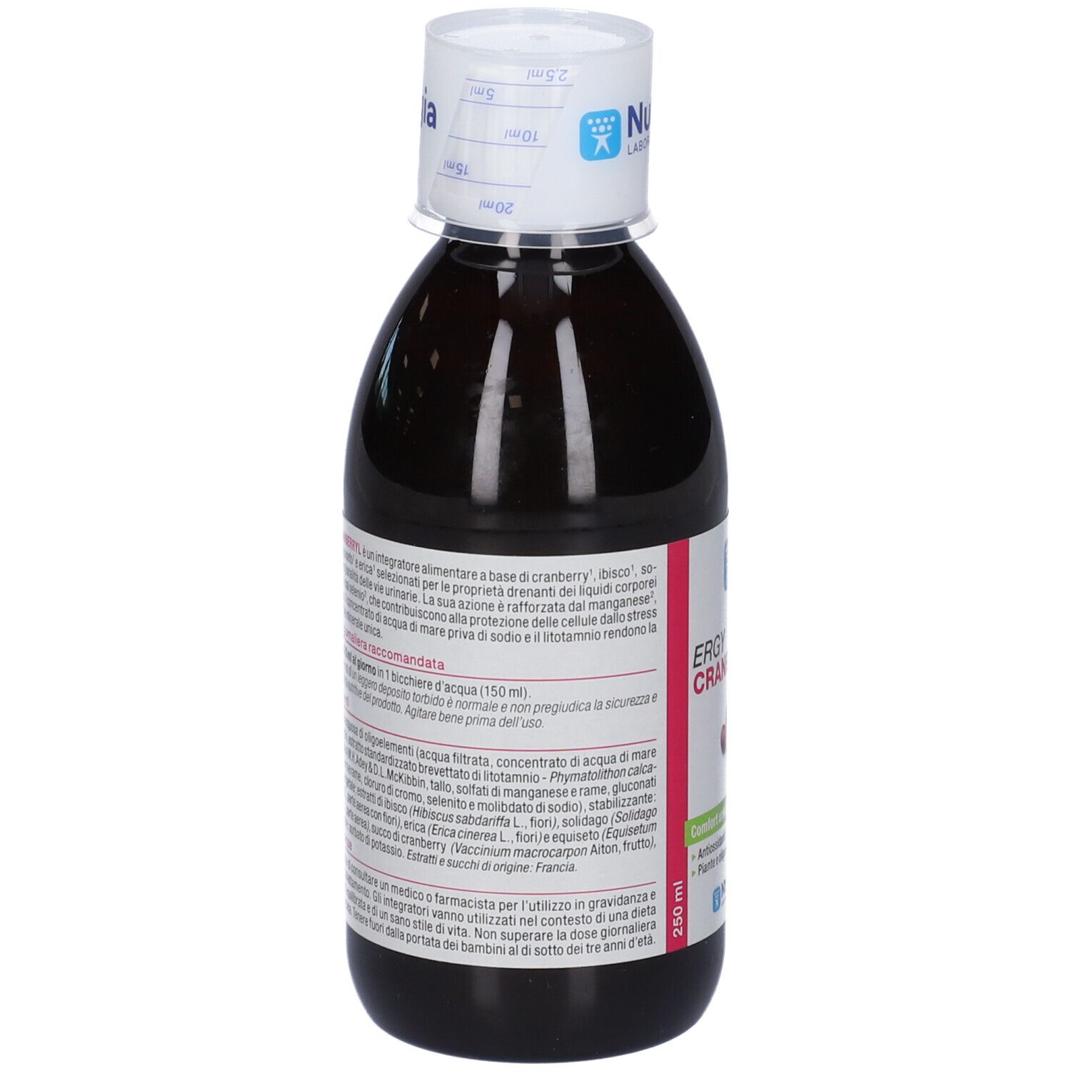 Vista posteriore di una bottiglia di liquido marrone. Etichetta con testo. Tappo bianco con logo.