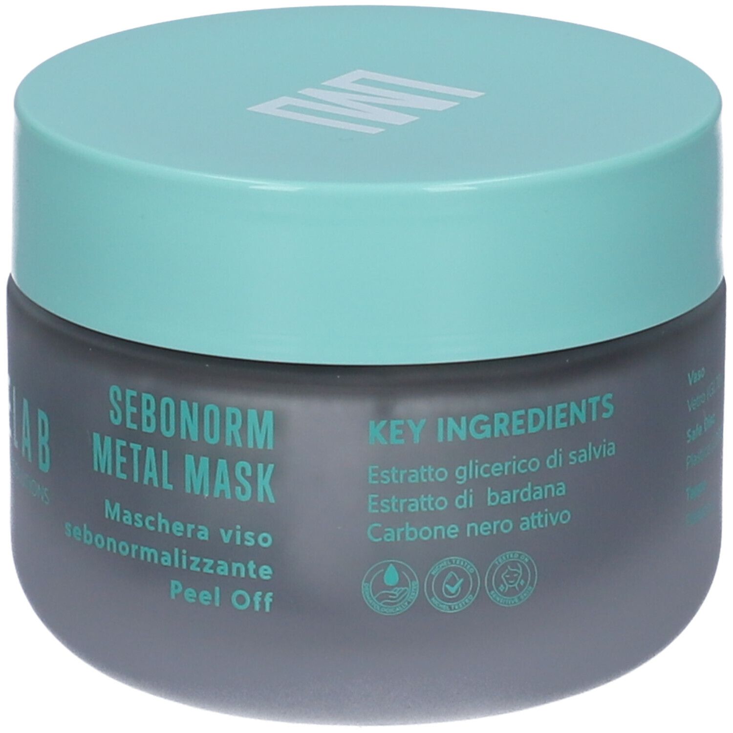 Vaso grigio scuro con coperchio turchese. Scritta LAMUSELAB. Testo: SEBONORM METAL MASK. Ingredienti chiave: Salvia, Bardana, Carbone attivo.