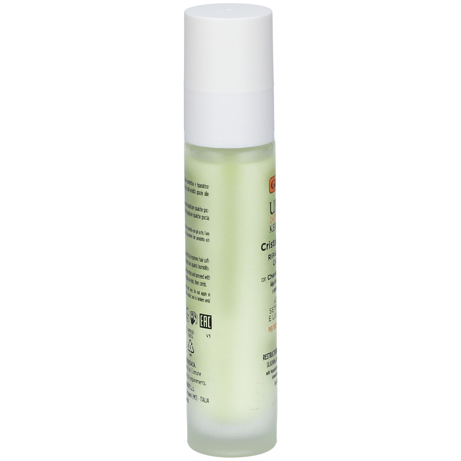 Retro del flacone. Testo in italiano. Simboli di riciclaggio. Flacone con liquido verdognolo.