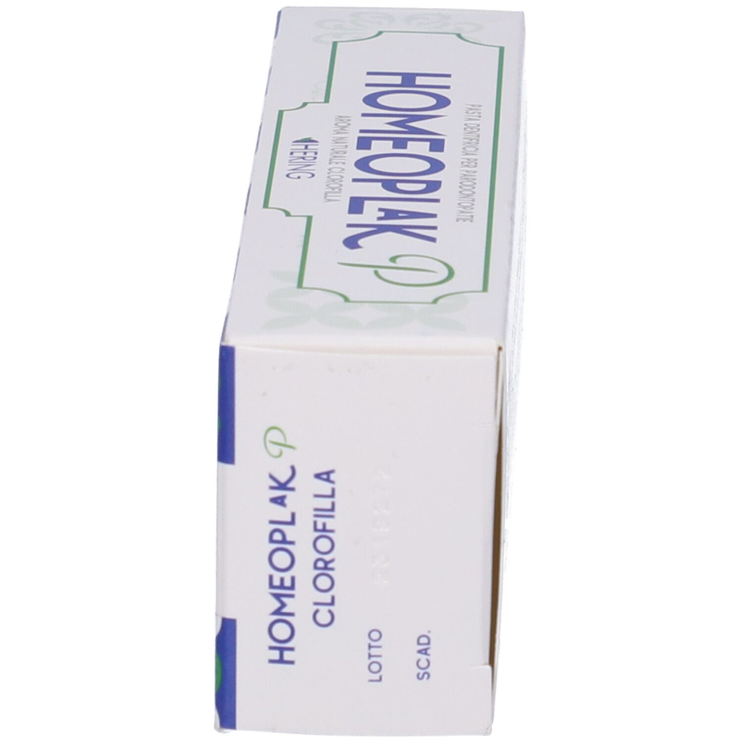 Scatola Homeoplak P, verde e bianca. Testo: Clorofilla. Marchio Hering.