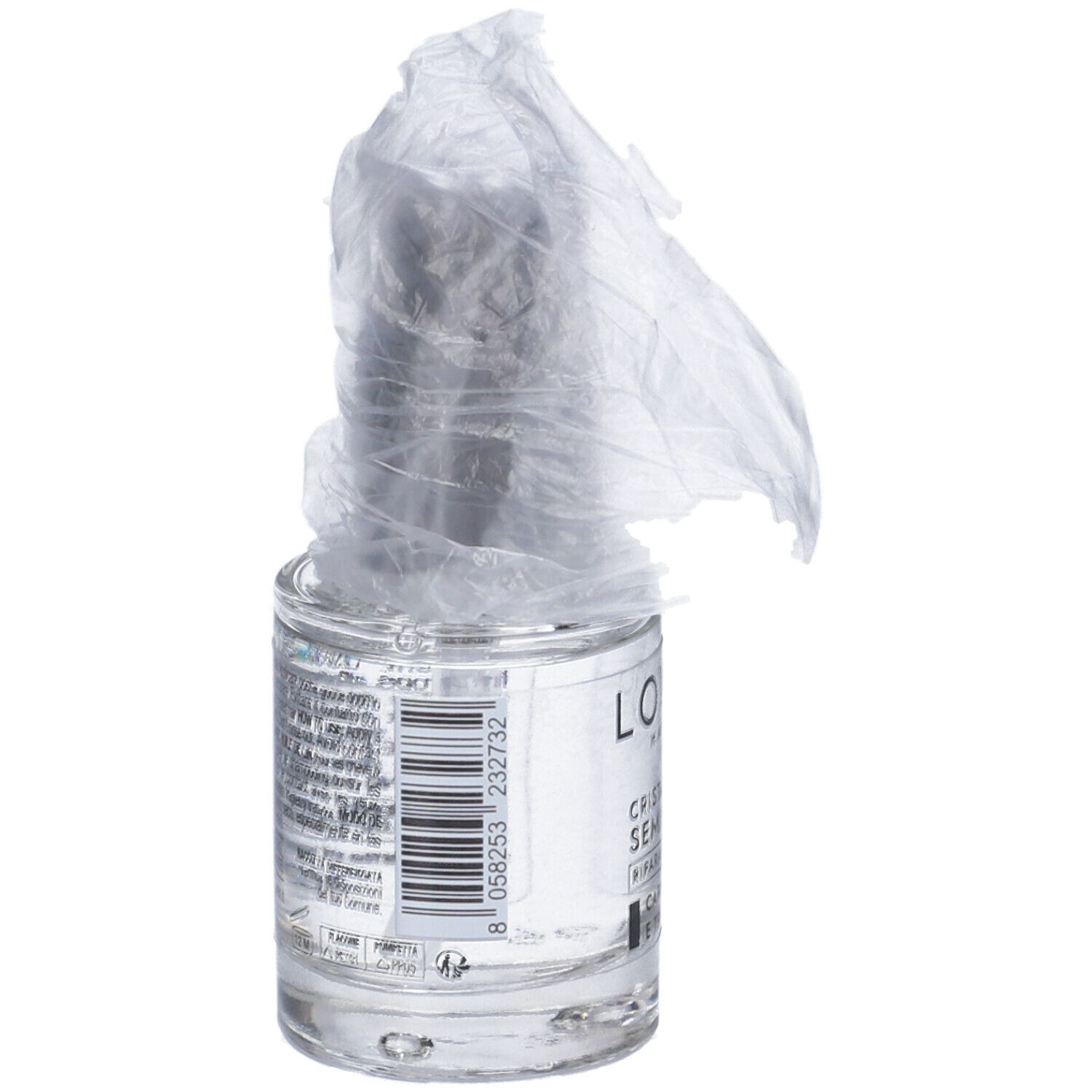 Flacone di vetro con liquido, parzialmente coperto da pellicola. Codice a barre e testo sul retro.