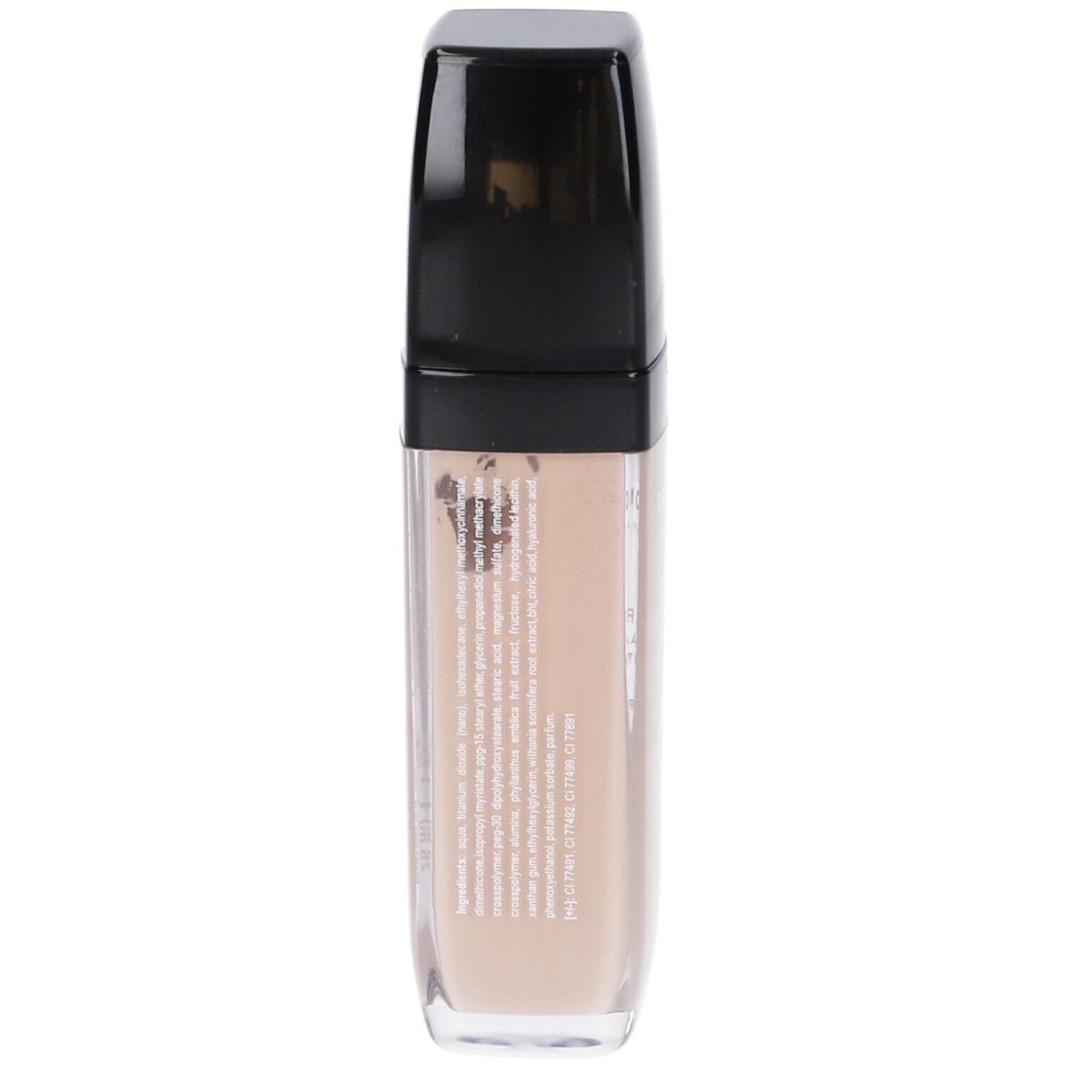 Retro del flacone di fondotinta. Testo con ingredienti e informazioni. Liquido beige in un flacone rettangolare trasparente.