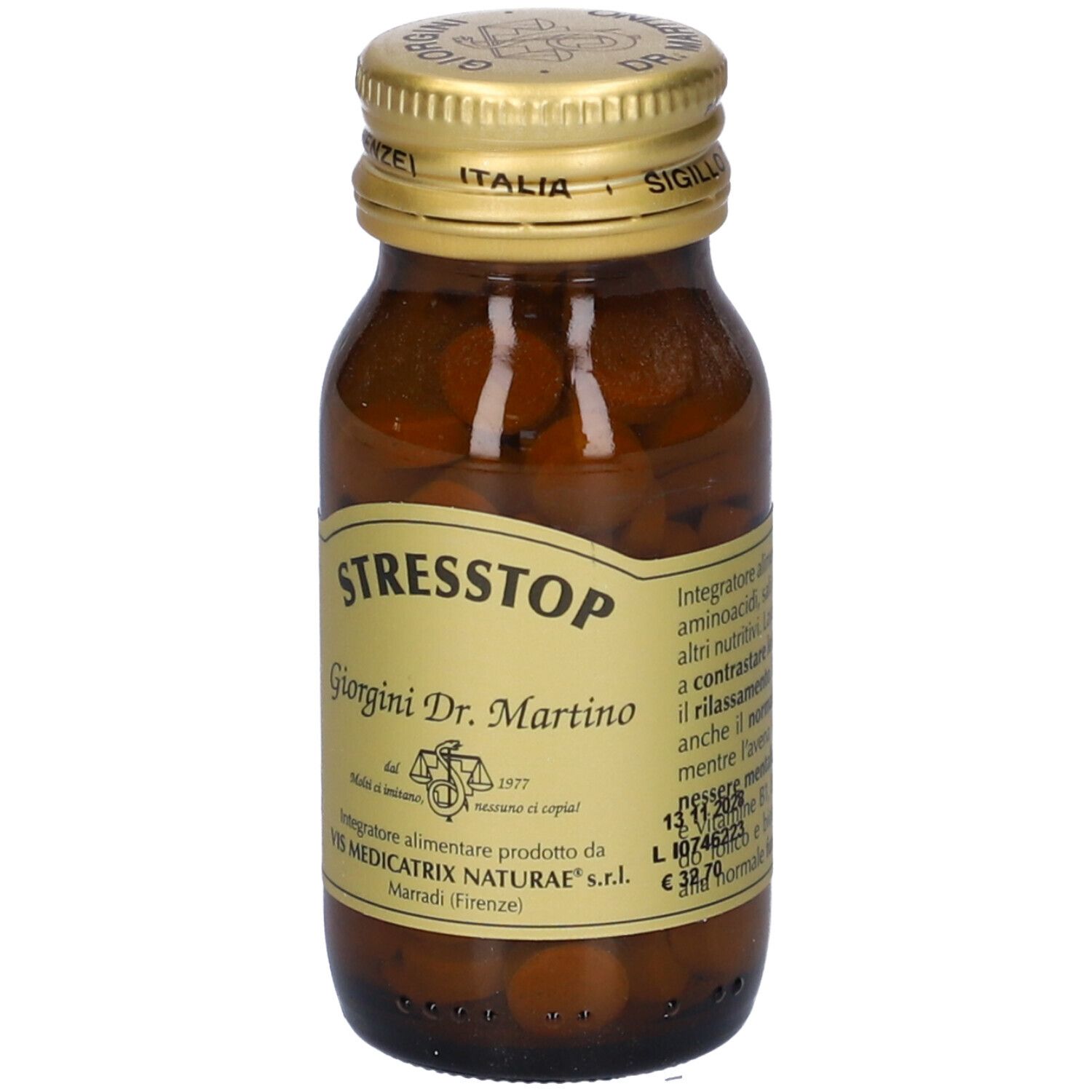 Flacone di vetro marrone con tappo dorato. Etichetta con nome STRESSTOP e altre informazioni.