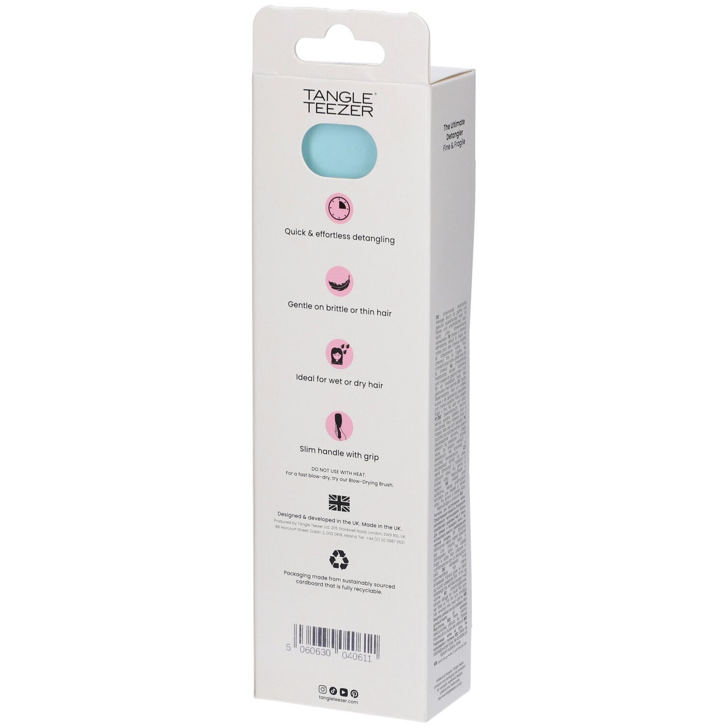 Confezione bianca con manico turchese. Marchio Tangle Teezer. Icone e testo sul retro.