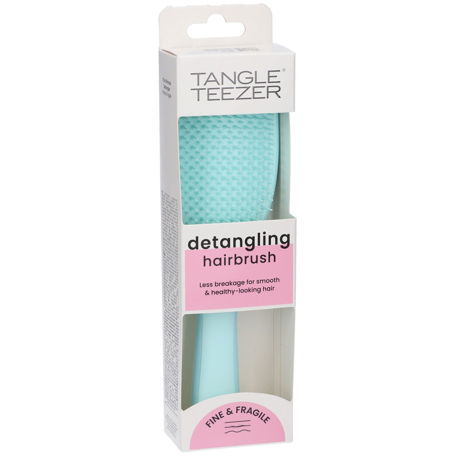 Spazzola districante turchese in confezione bianca. Marchio Tangle Teezer. Scritta: Fine & Fragile.
