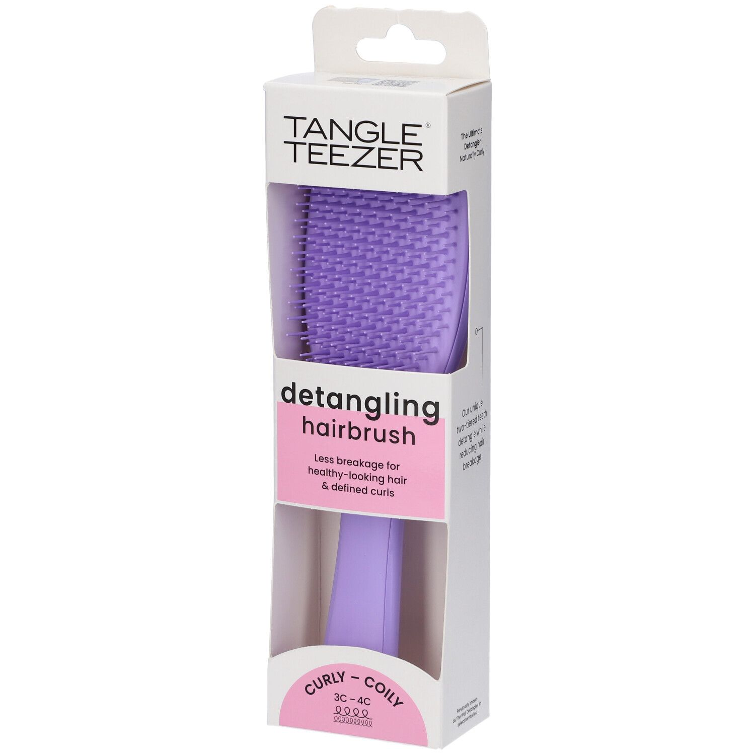 Spazzola districante viola in confezione. Marchio Tangle Teezer. Per capelli ricci. Confezione con gancio.
