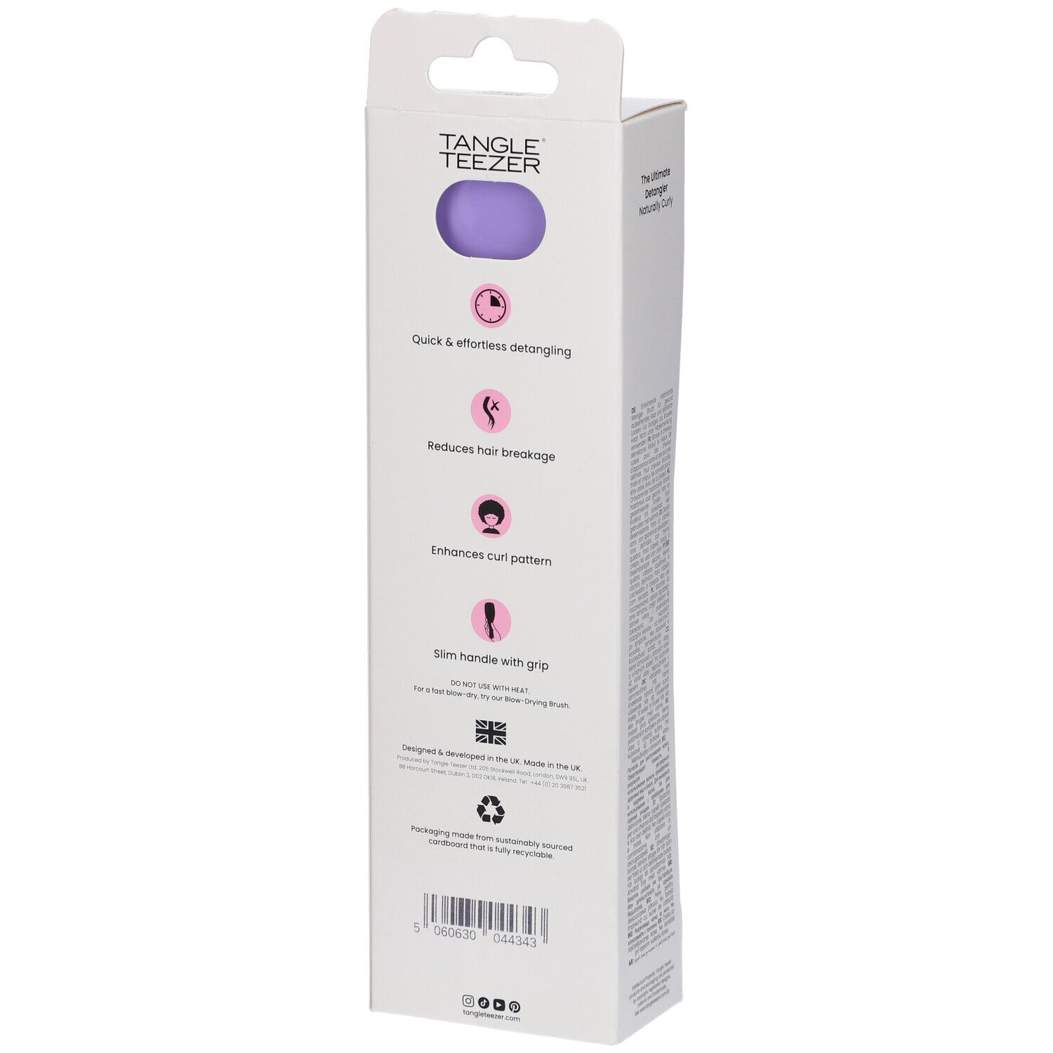 Confezione della spazzola districante. Marchio Tangle Teezer. Caratteristiche del prodotto e simboli laterali.