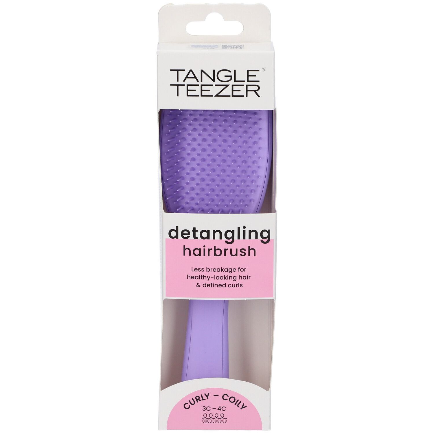 Spazzola districante viola in confezione. Marchio Tangle Teezer. Per capelli ricci. Confezione con gancio.