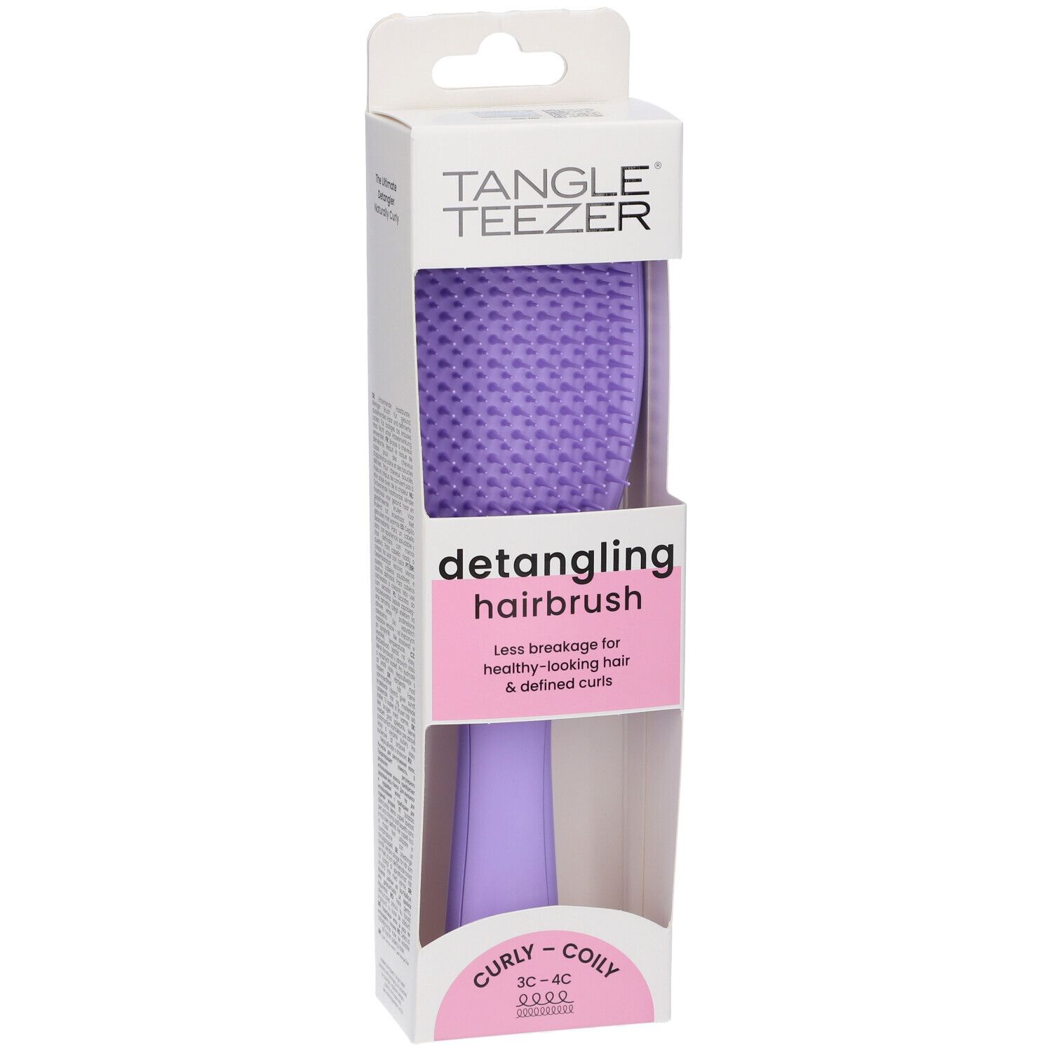 Spazzola districante viola in confezione. Marchio Tangle Teezer. Per capelli ricci. Confezione con gancio.
