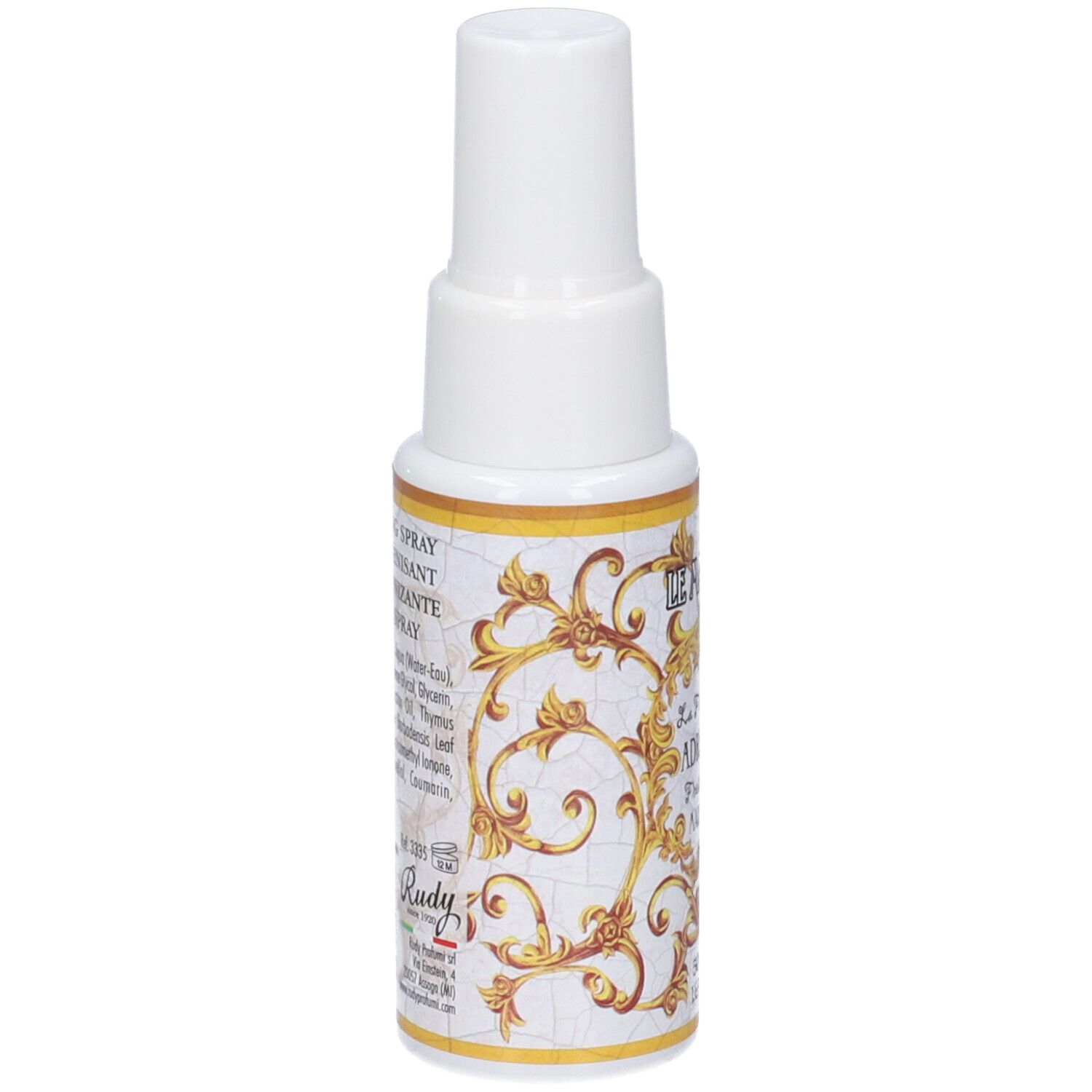 Retro di un flacone spray bianco con etichetta oro e bianca, mostra ingredienti e informazioni sul prodotto.