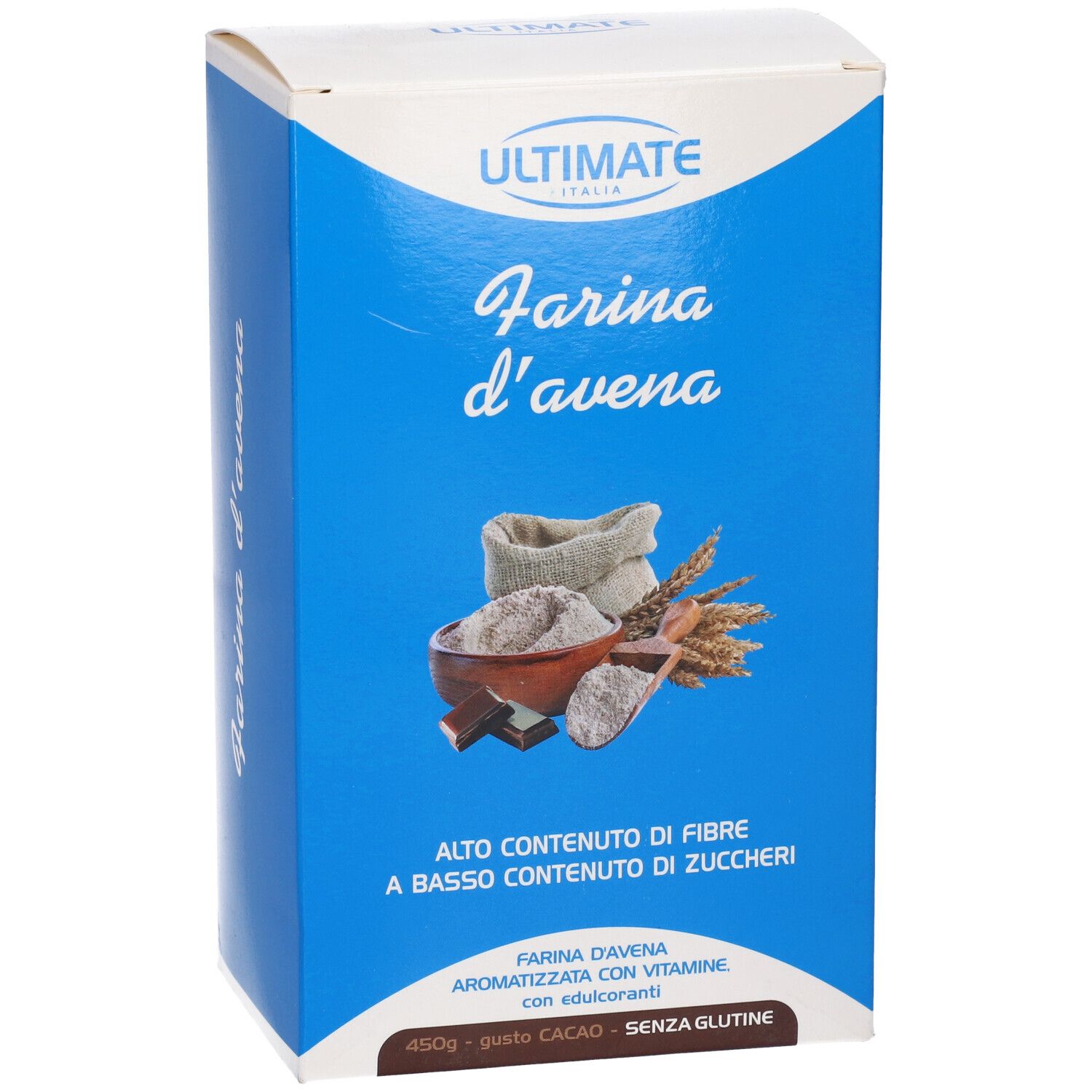 Scatola blu con immagine del prodotto. In alto: marchio ULTIMATE ITALIA. Testo: Farina d'avena. In basso: 450g, senza glutine.