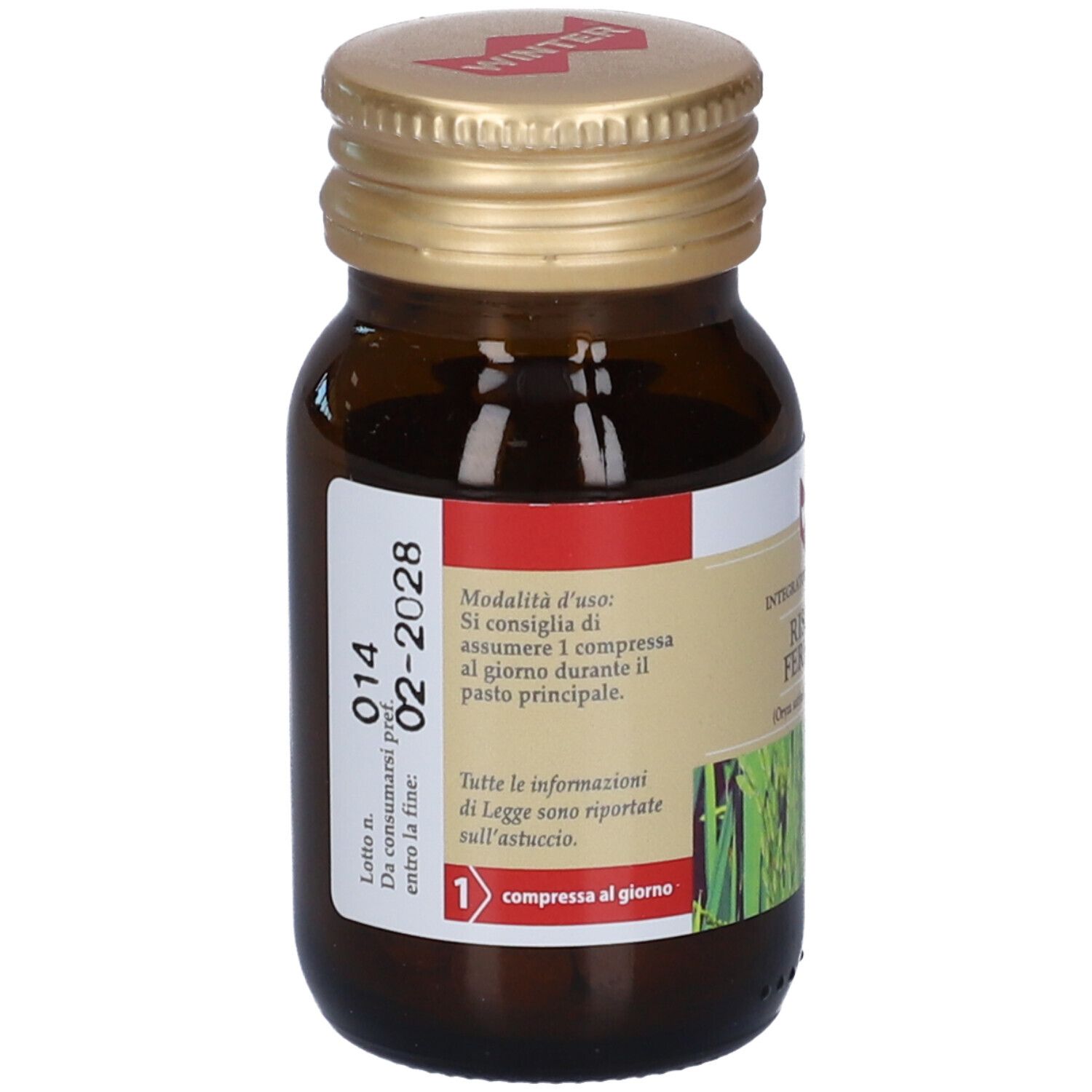 Flacone di vetro marrone con tappo dorato. Etichetta con informazioni sul prodotto e data di scadenza. 1 compressa al giorno.