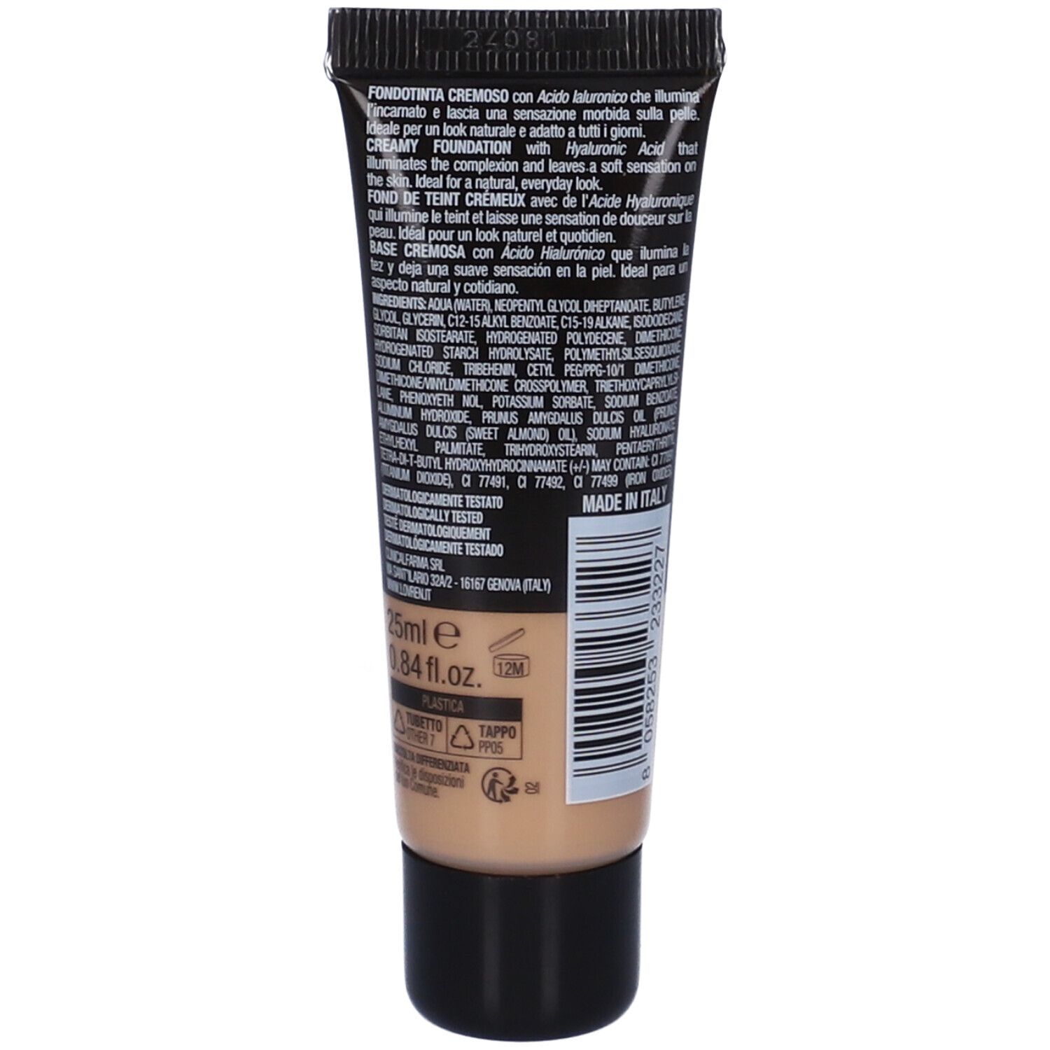 Retro del tubo. Tubo nero con testo e codice a barre. Fondotinta beige visibile.