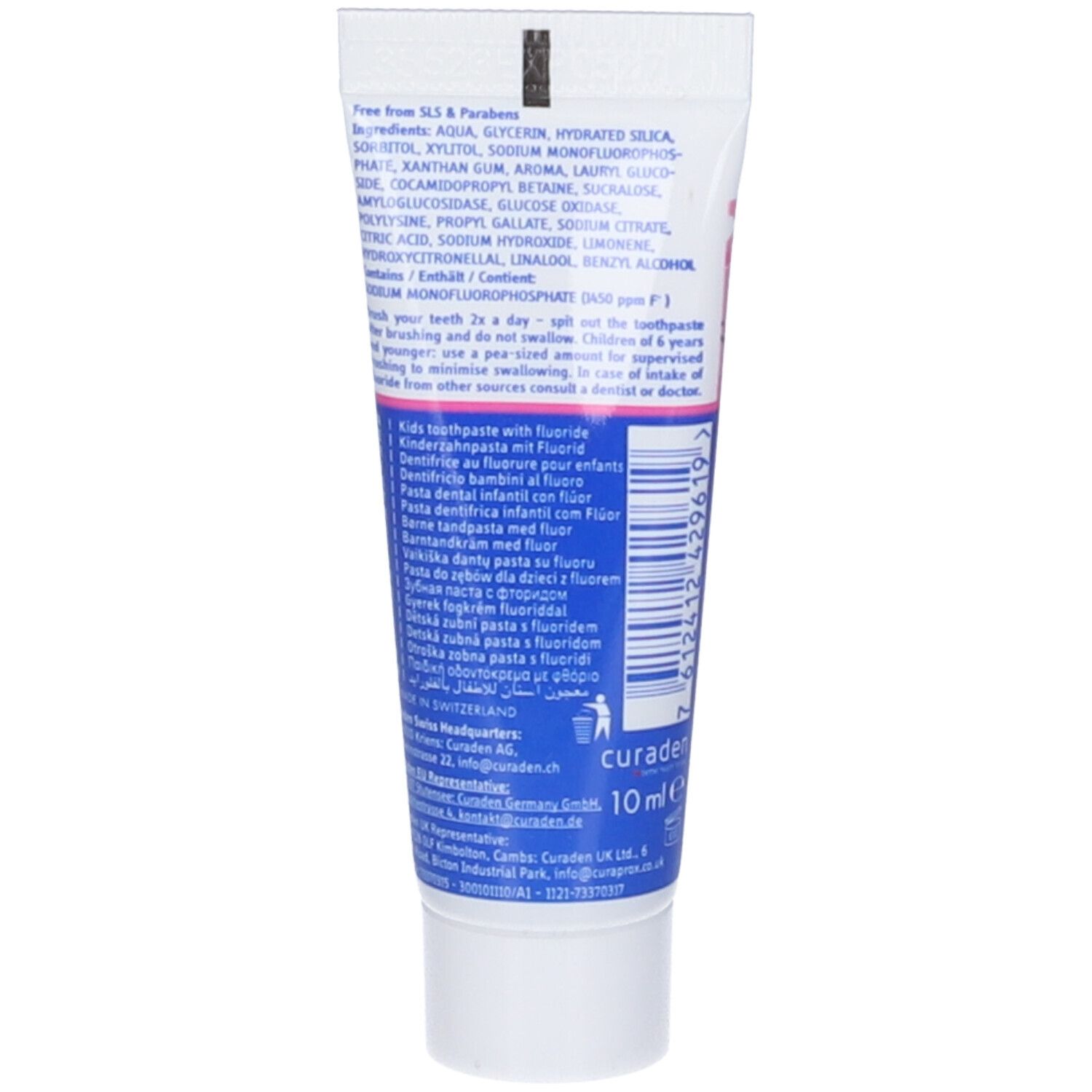 Retro del tubetto di dentifricio. Contiene testo multilingue, ingredienti e informazioni sul produttore.