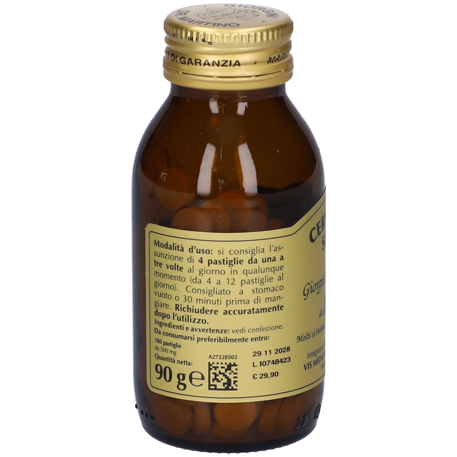 Retro di un flacone di vetro marrone con tappo dorato. Etichetta con informazioni sul prodotto e QR code. 90g.