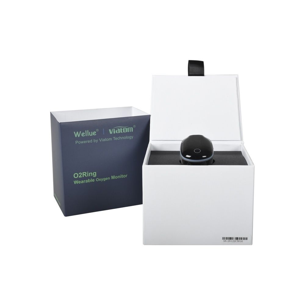 Scatola aperta con monitor ad anello. Scatola con nome del prodotto e logo. Monitor ad anello con display.