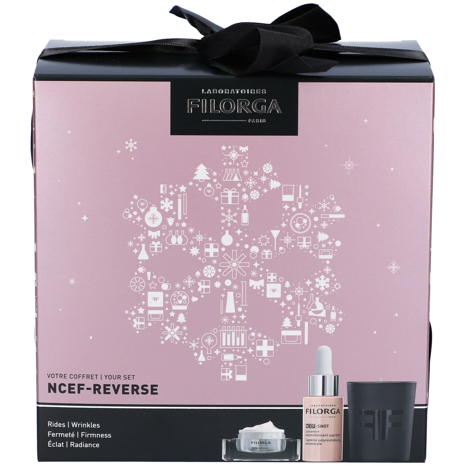 Confezione regalo con fiocco. Logo FILORGA. Scritta: NCEF-REVERSE. Prodotti: siero, crema, contenitore nero.