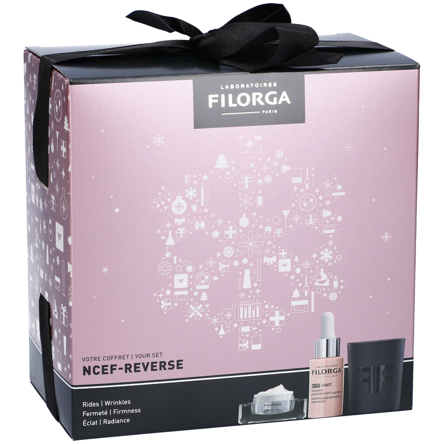 Confezione regalo con fiocco. Logo FILORGA. Scritta: NCEF-REVERSE. Prodotti: siero, crema, contenitore nero.