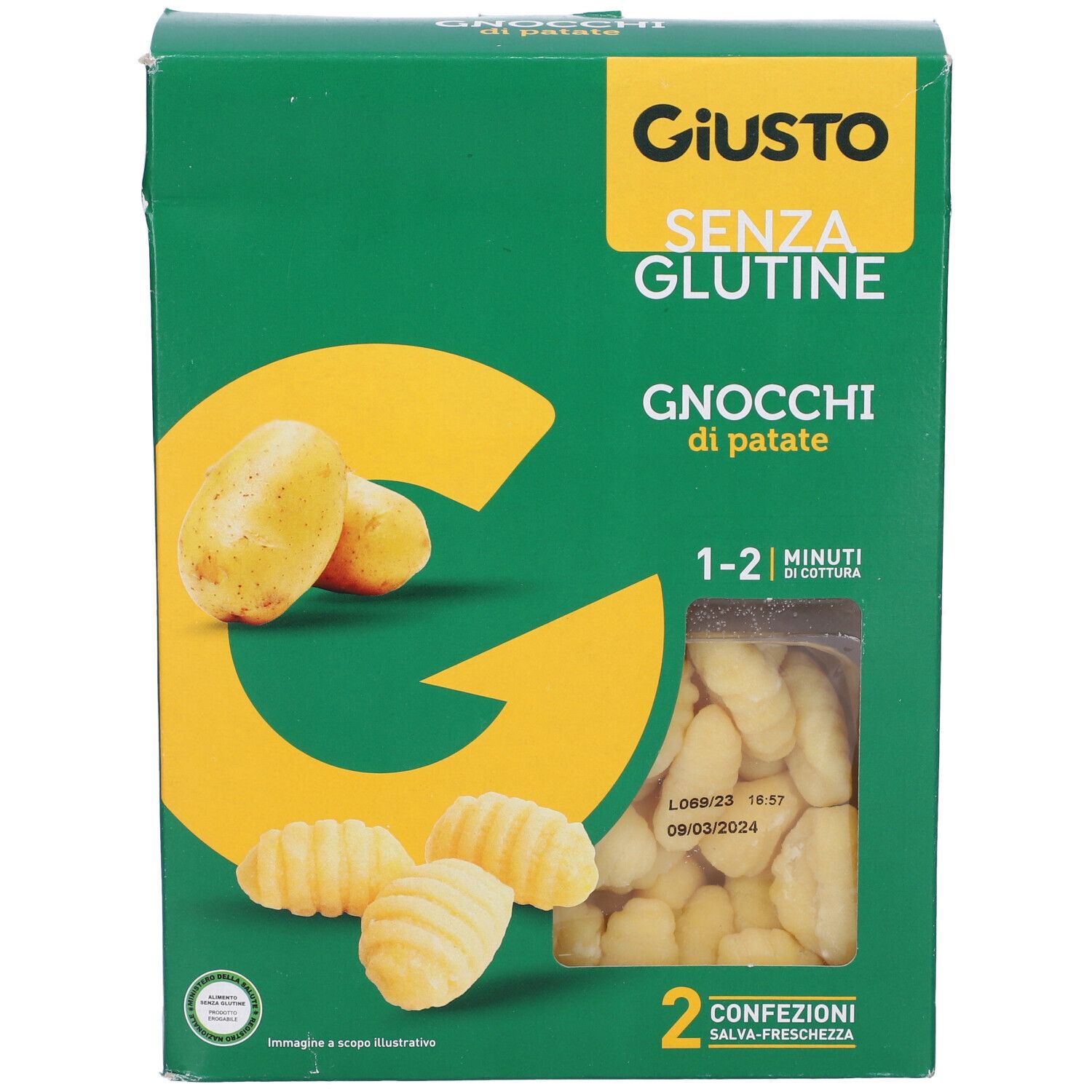 Scatola verde con gnocchi. Logo giallo con patate e gnocchi. Testo: Giusto Senza Glutine, Gnocchi di patate. Data di scadenza.