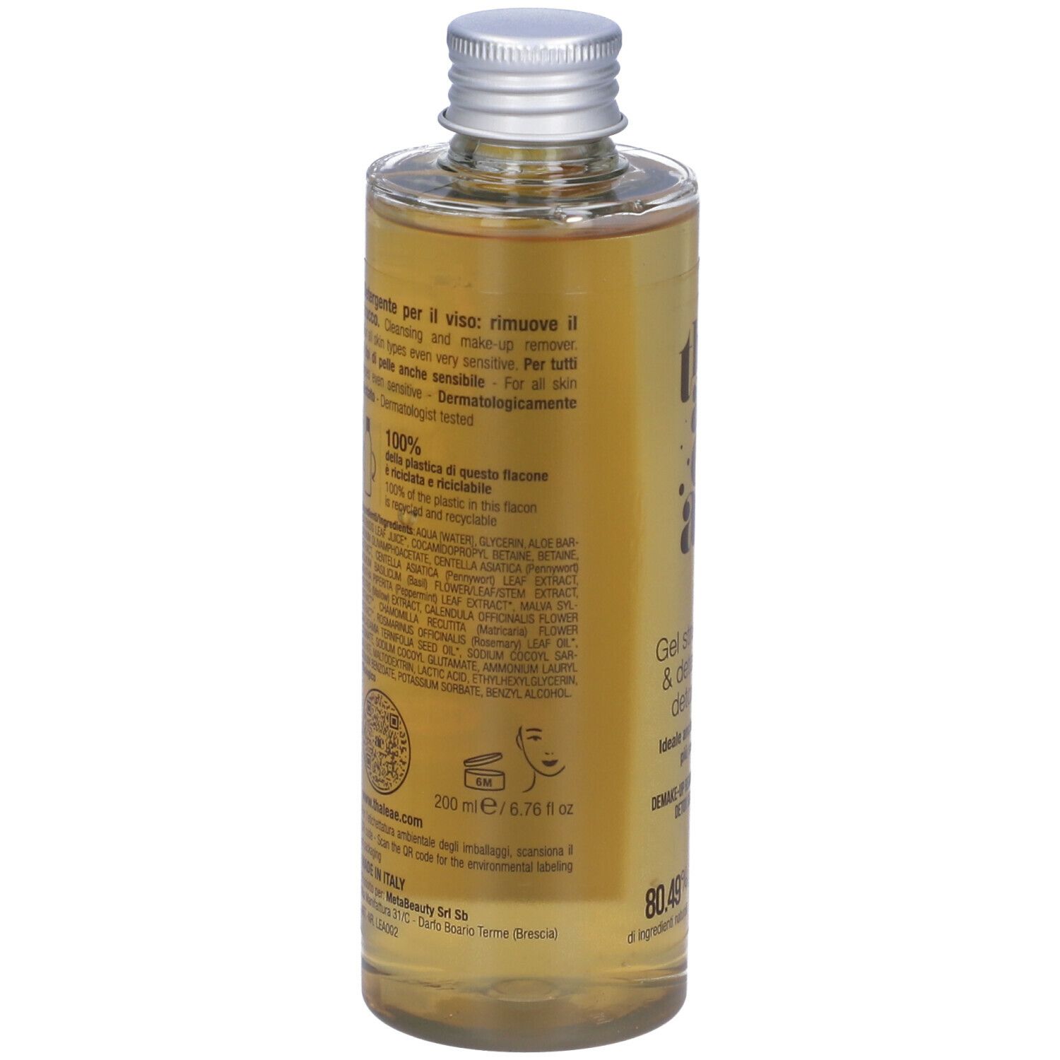 Retro flacone. Etichetta con ingredienti, volume e informazioni produttore. Tappo argento.