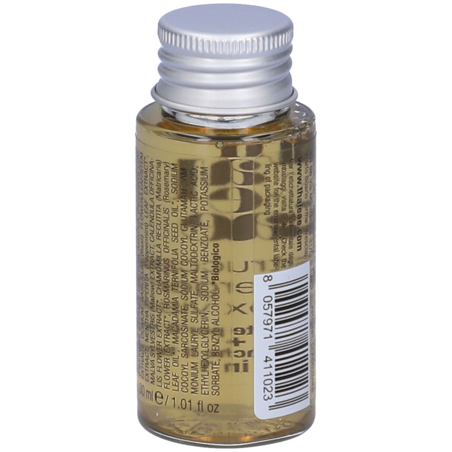 Primo piano di un piccolo flacone con tappo argentato. Etichetta con ingredienti e testo.