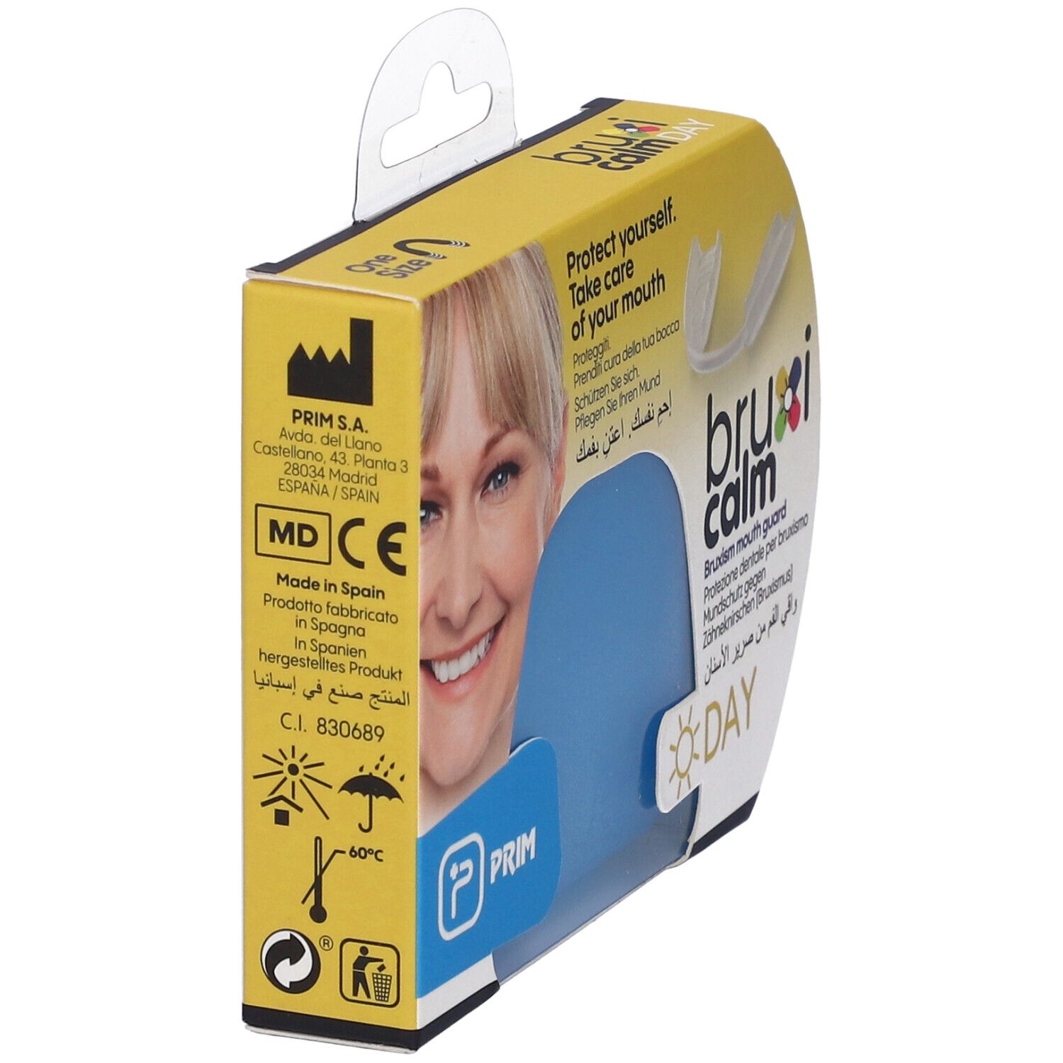 Vista laterale della confezione. Custodia blu visibile. Testo: bruxi calm DAY, PRIM, MD CE, Made in Spain.