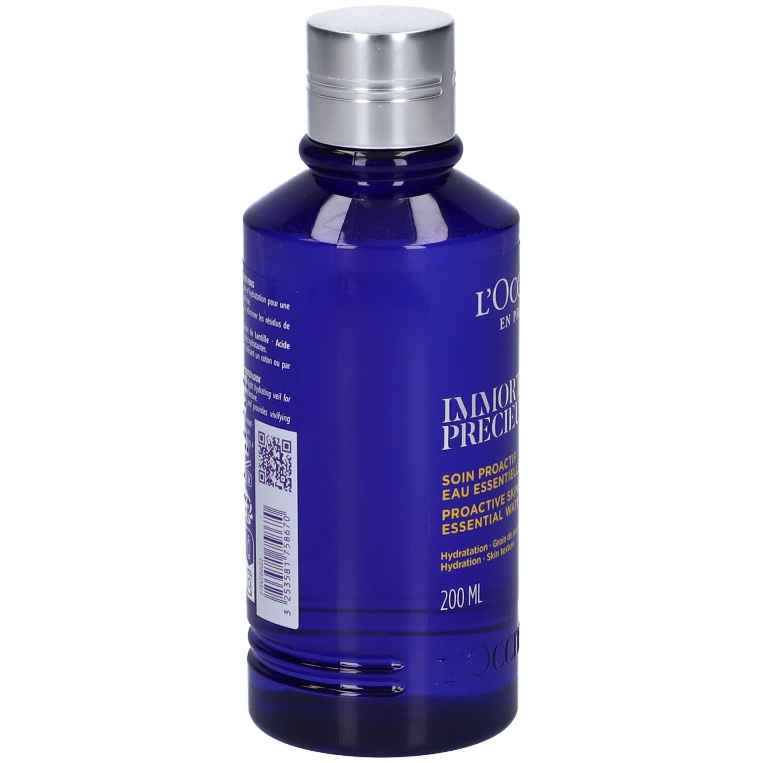 Flacone blu con tappo argentato. Scritta: L'Occitane, Immortelle Précieuse, 200 ml, codice QR.