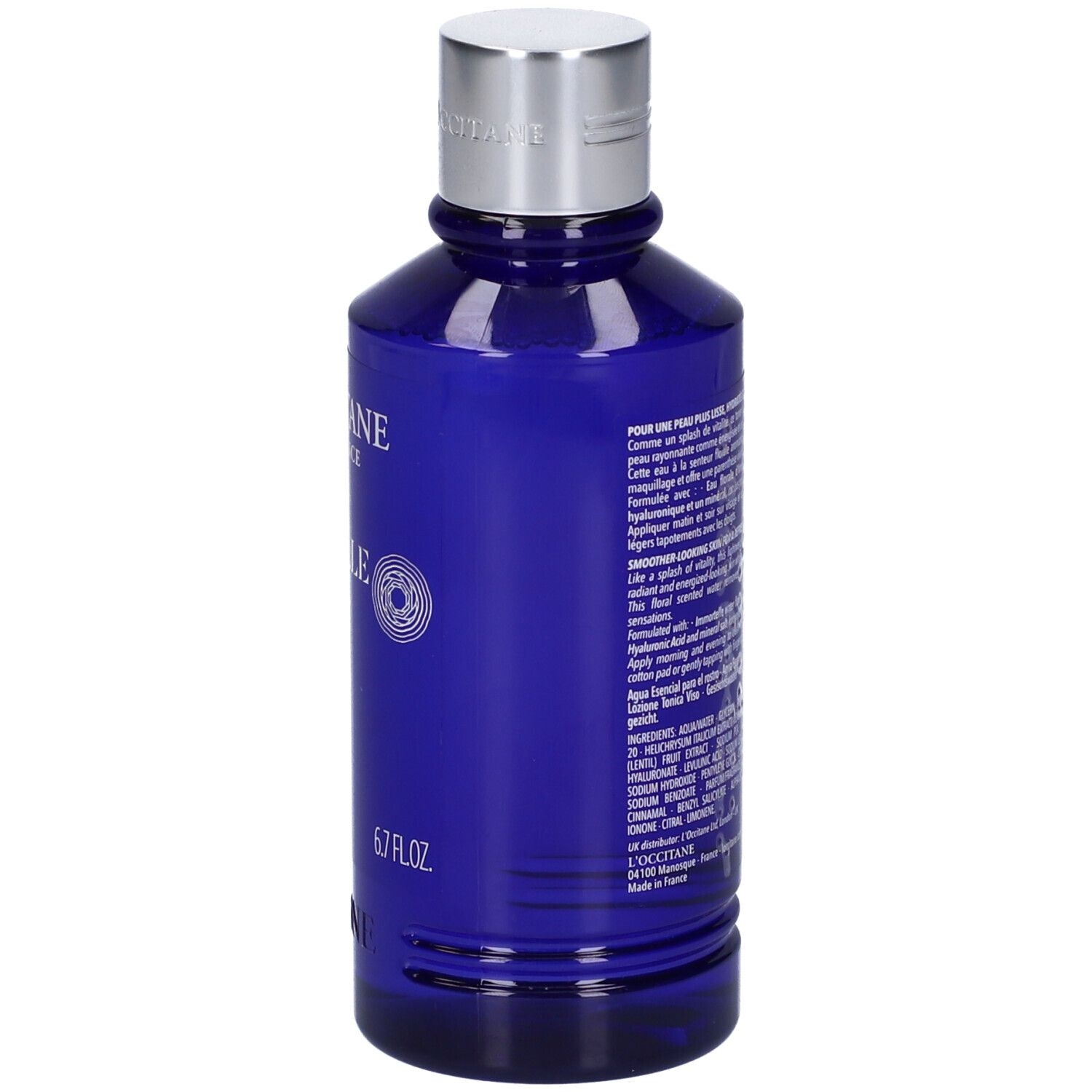 Flacone blu con tappo argentato. Retro con testo e 6.7 FL.OZ. Scritta: L'Occitane.