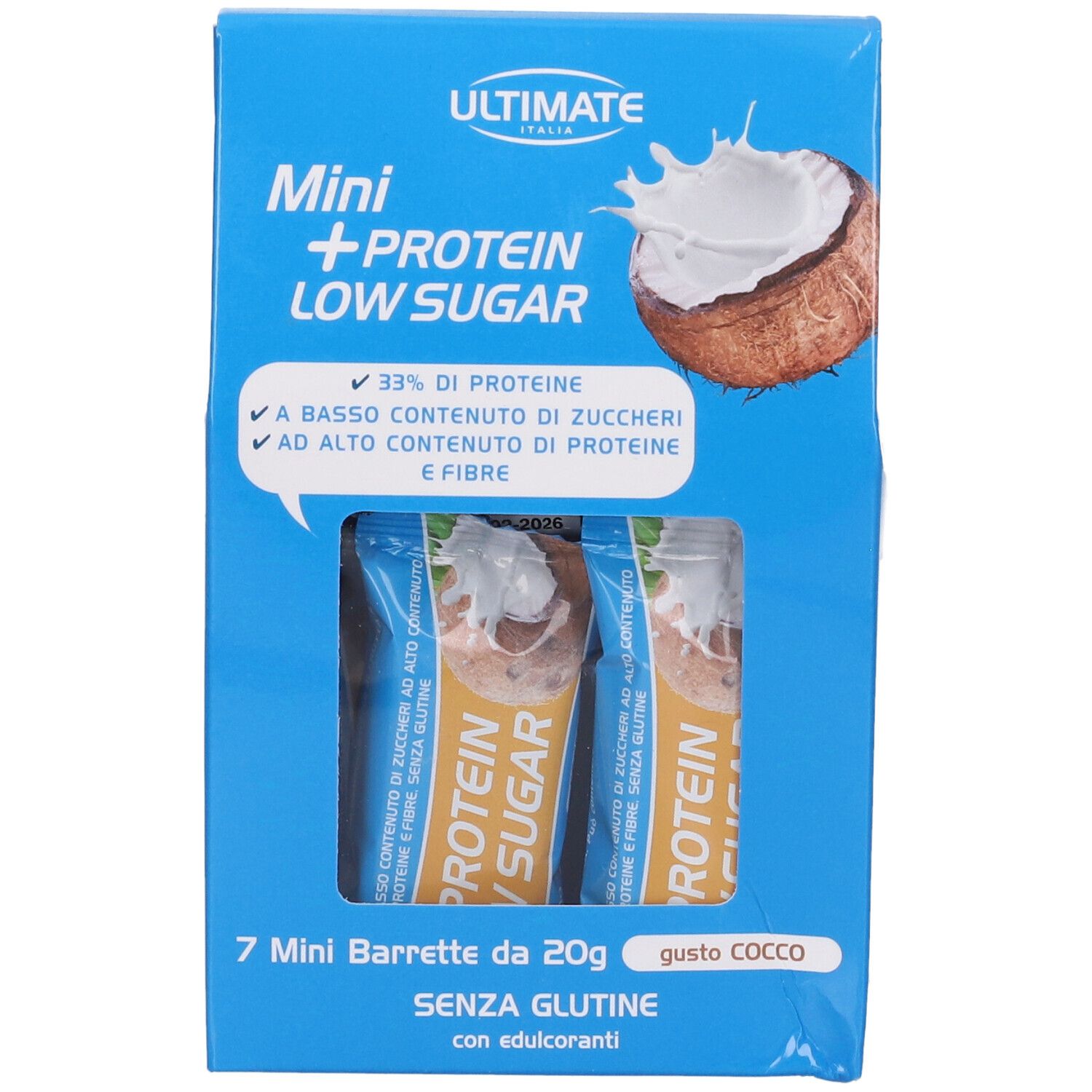 Confezione blu 'ULTIMATE' con 'Mini + Protein Low Sugar'. Contiene 3 barrette. Illustrazione cocco.