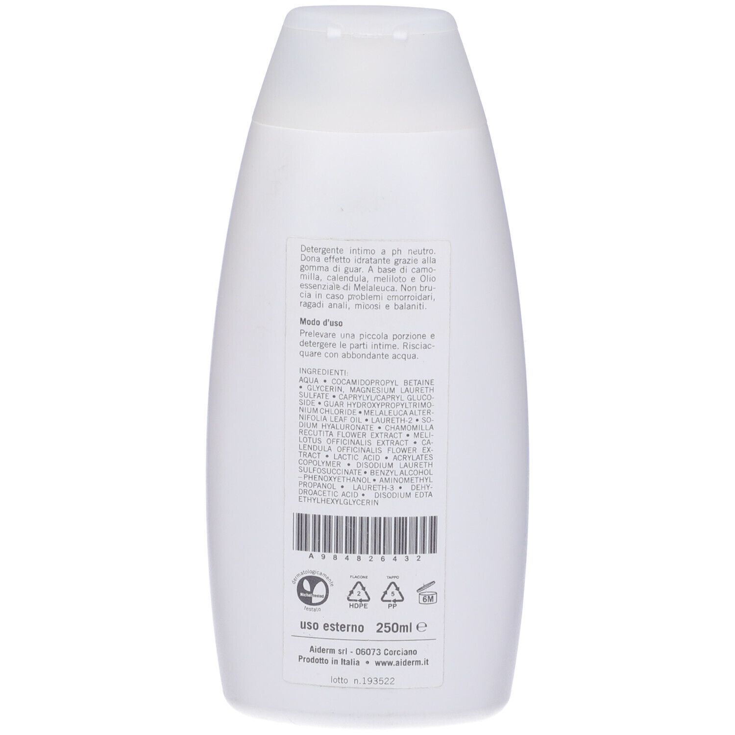 Retro del flacone bianco. Testo e codice a barre stampati.