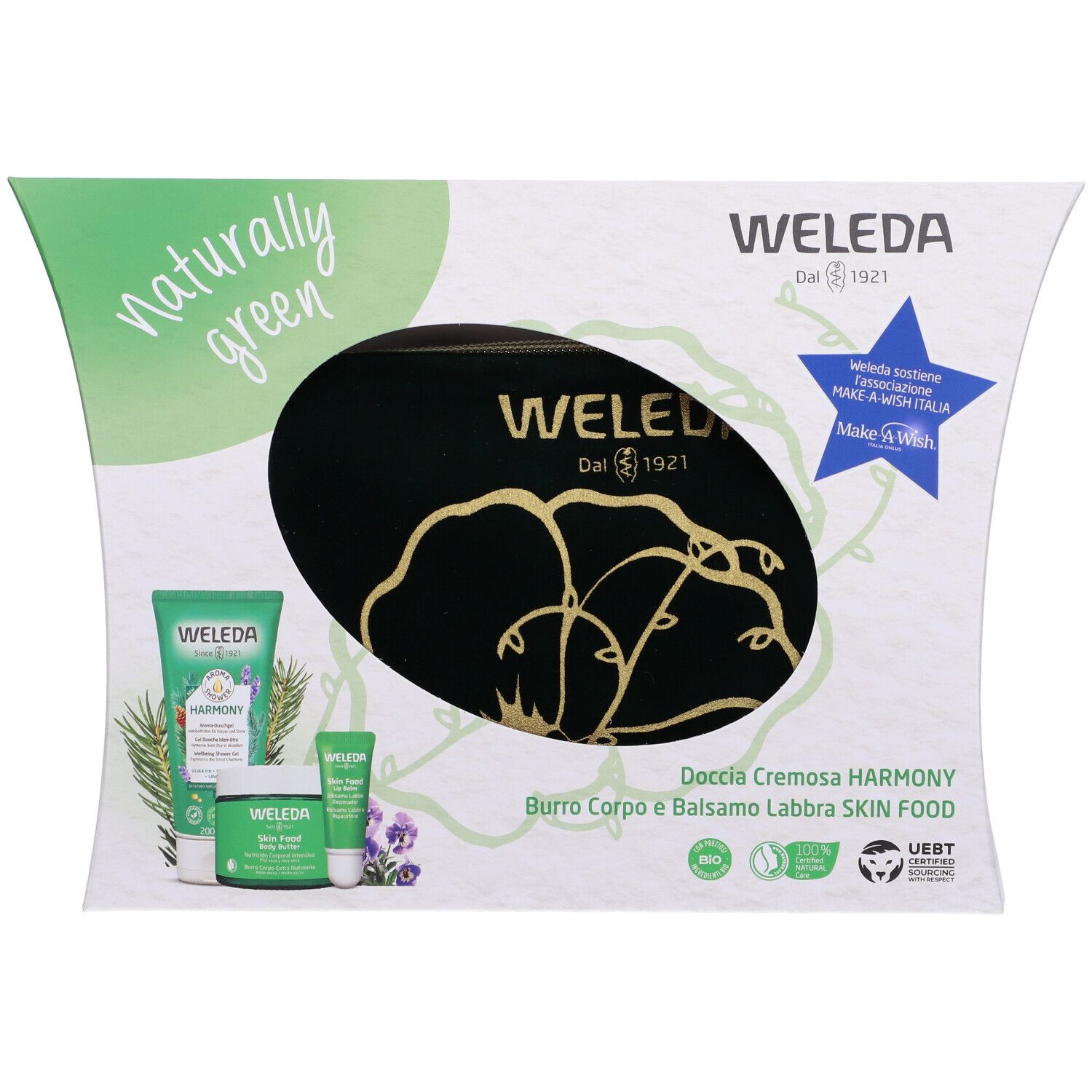 Confezione regalo Weleda Naturally Green. Contiene prodotti e logo Make-A-Wish. Scritta Weleda e certificazioni.