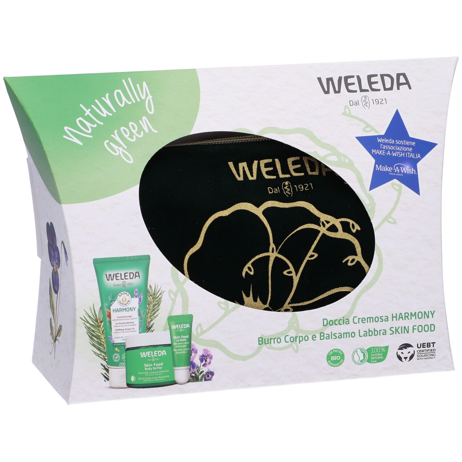 Confezione regalo Weleda Naturally Green. Contiene prodotti e logo Make-A-Wish. Scritta Weleda e fiore.