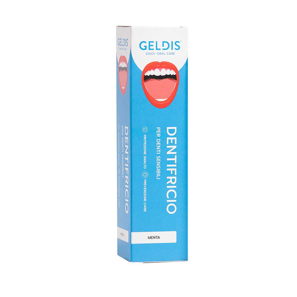 Scatola blu di dentifricio. Logo Geldis, nome del prodotto e immagine di bocca. Testo: Per denti sensibili.