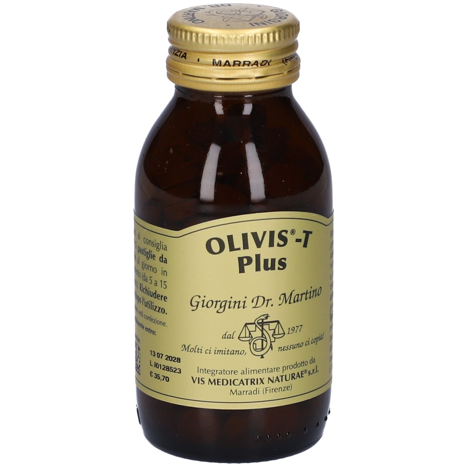 Flacone di vetro marrone con tappo dorato. Etichetta con nome del prodotto Olivis-T Plus e altre informazioni.