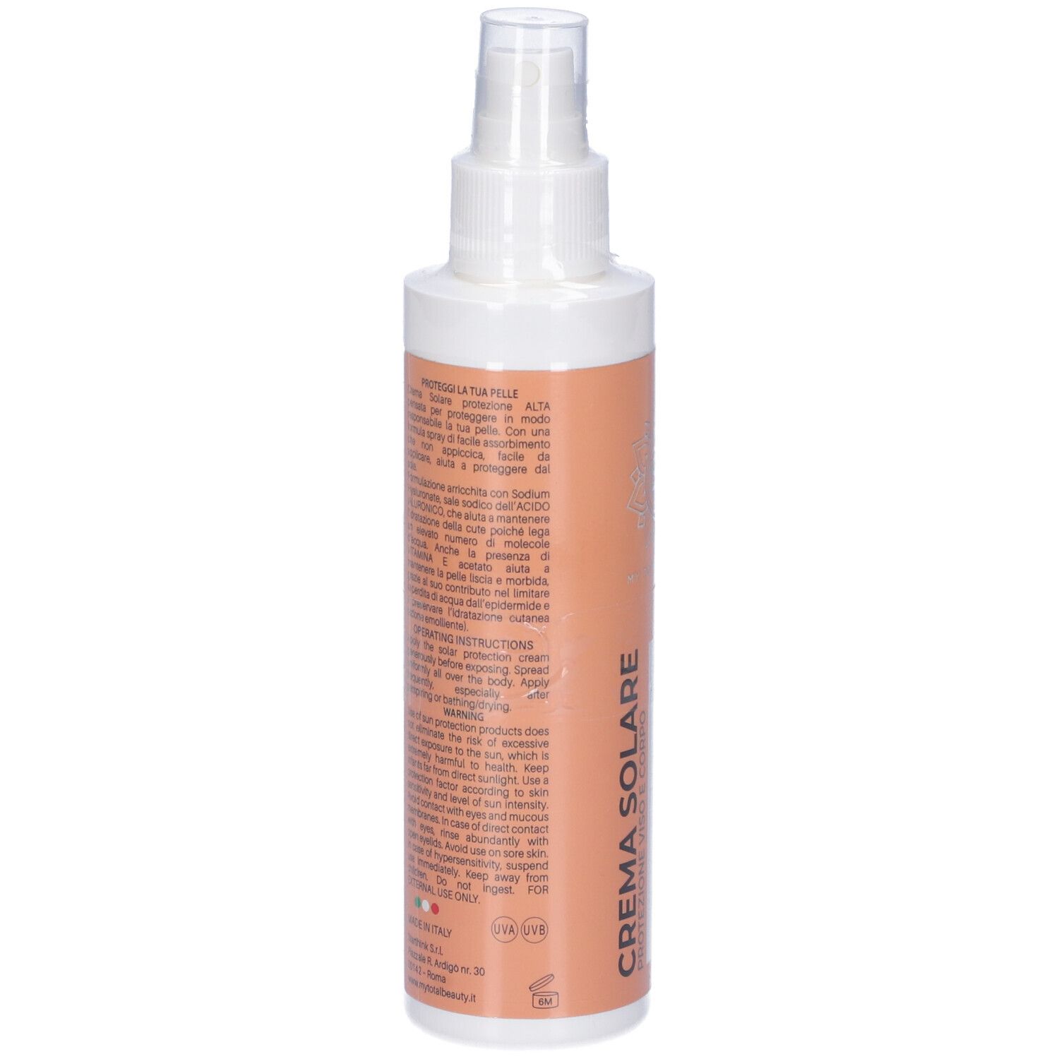 Retro del flacone spray. Testo su etichetta arancione. Contiene istruzioni e ingredienti. Con logo.