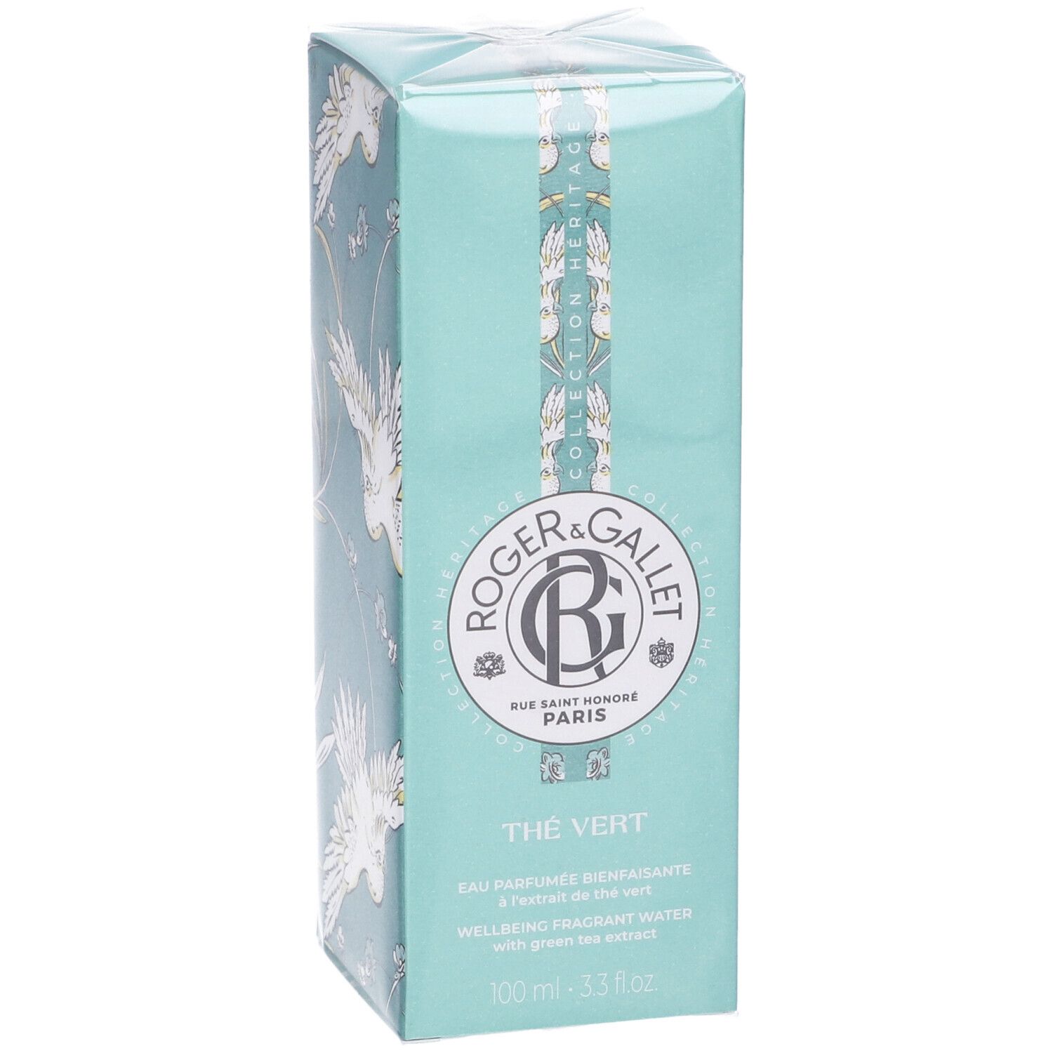 Scatola turchese con motivo di uccelli. Logo Roger & Gallet, testo Thé Vert. Confezione con motivo floreale.