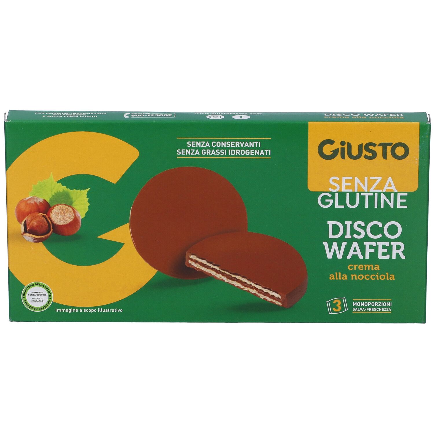 Scatola verde Giusto Senza Glutine Disco Wafer. Mostra wafer alla crema di nocciole. Scritte: Senza glutine, senza conservanti.