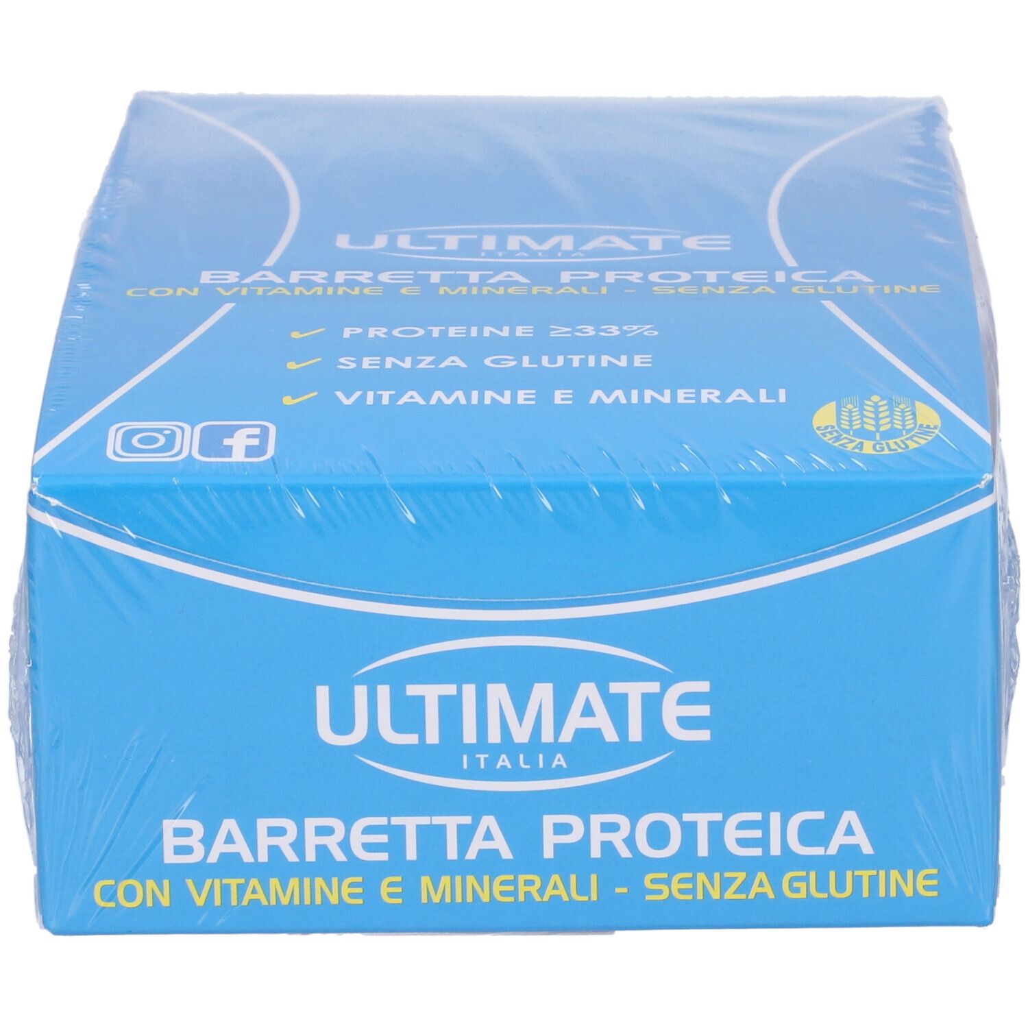 Scatola blu confezionata con 'Ultimate Italia' e 'Barretta Proteica'. Contiene proteine, vitamine e minerali. Senza glutine.