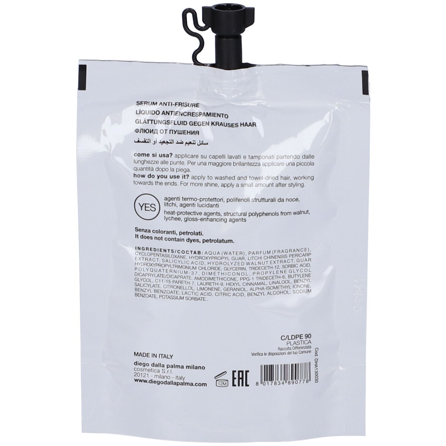 Retro della busta bianca con chiusura nera. Testo multilingue, ingredienti e codice a barre.