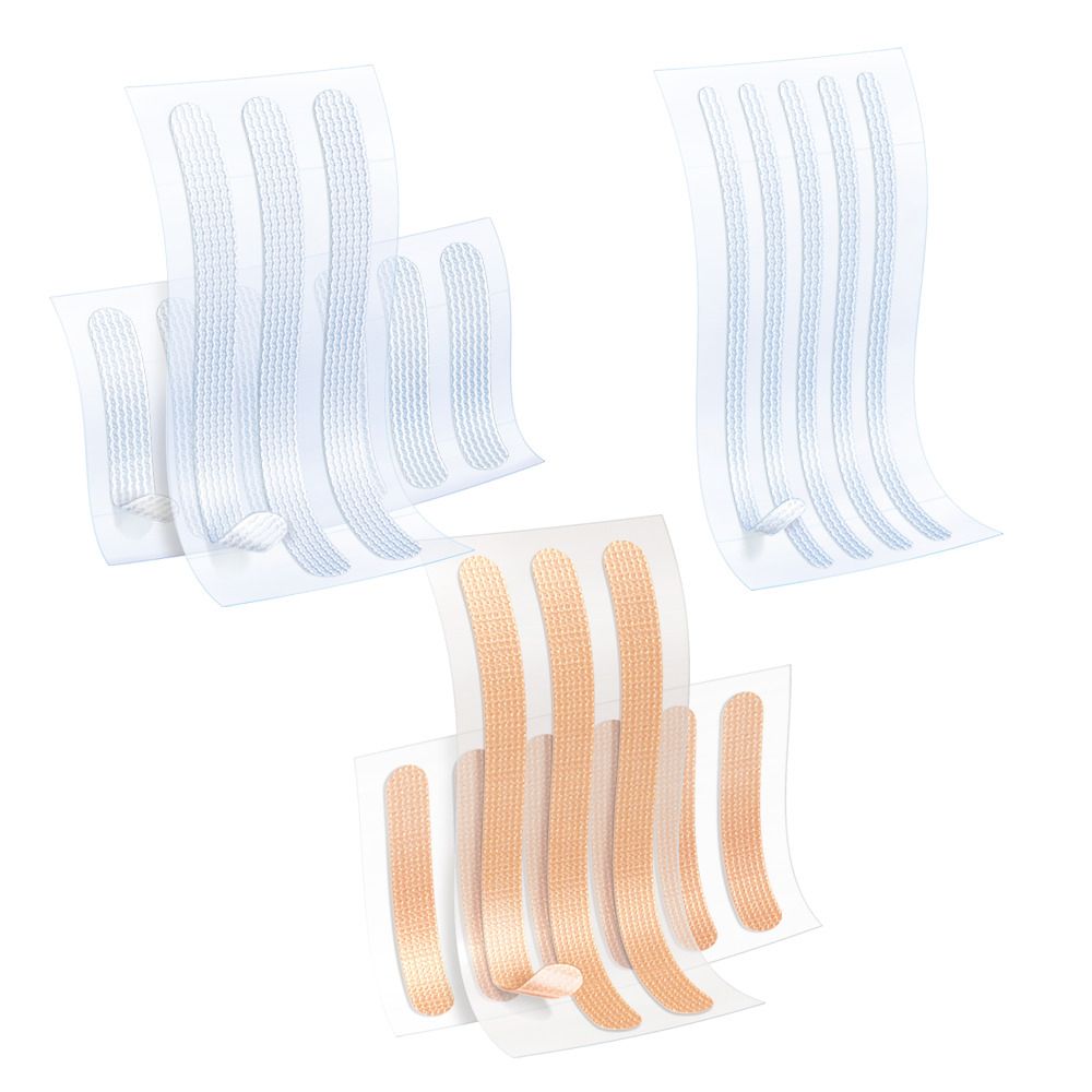 Diverse confezioni di strisce per la chiusura delle ferite. Strisce blu e beige su supporto trasparente.