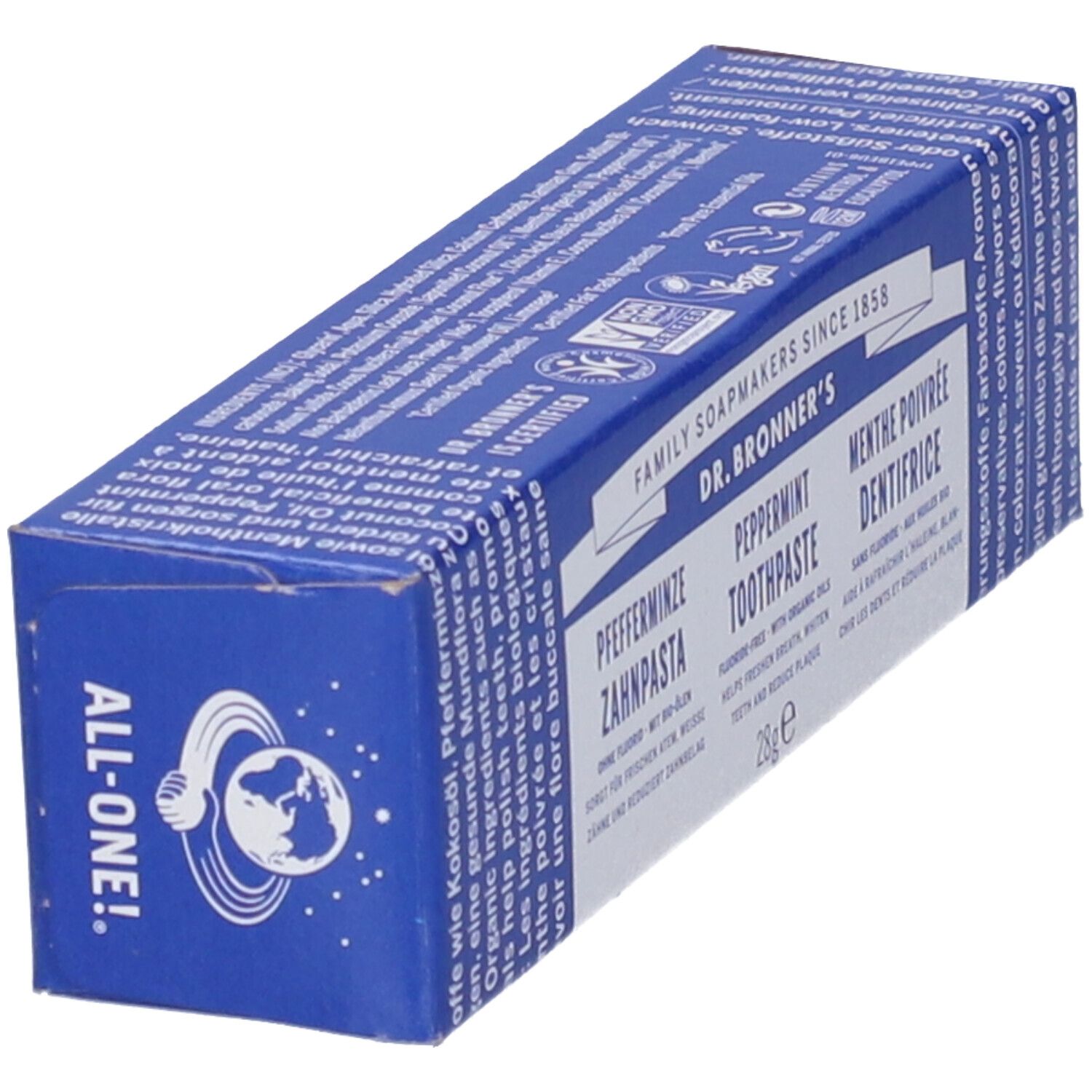Scatola blu con dentifricio DR. BRONNER'S. Scritto: Pfefferminz, Peppermint, Menthe poivrée. Logo: All-One.