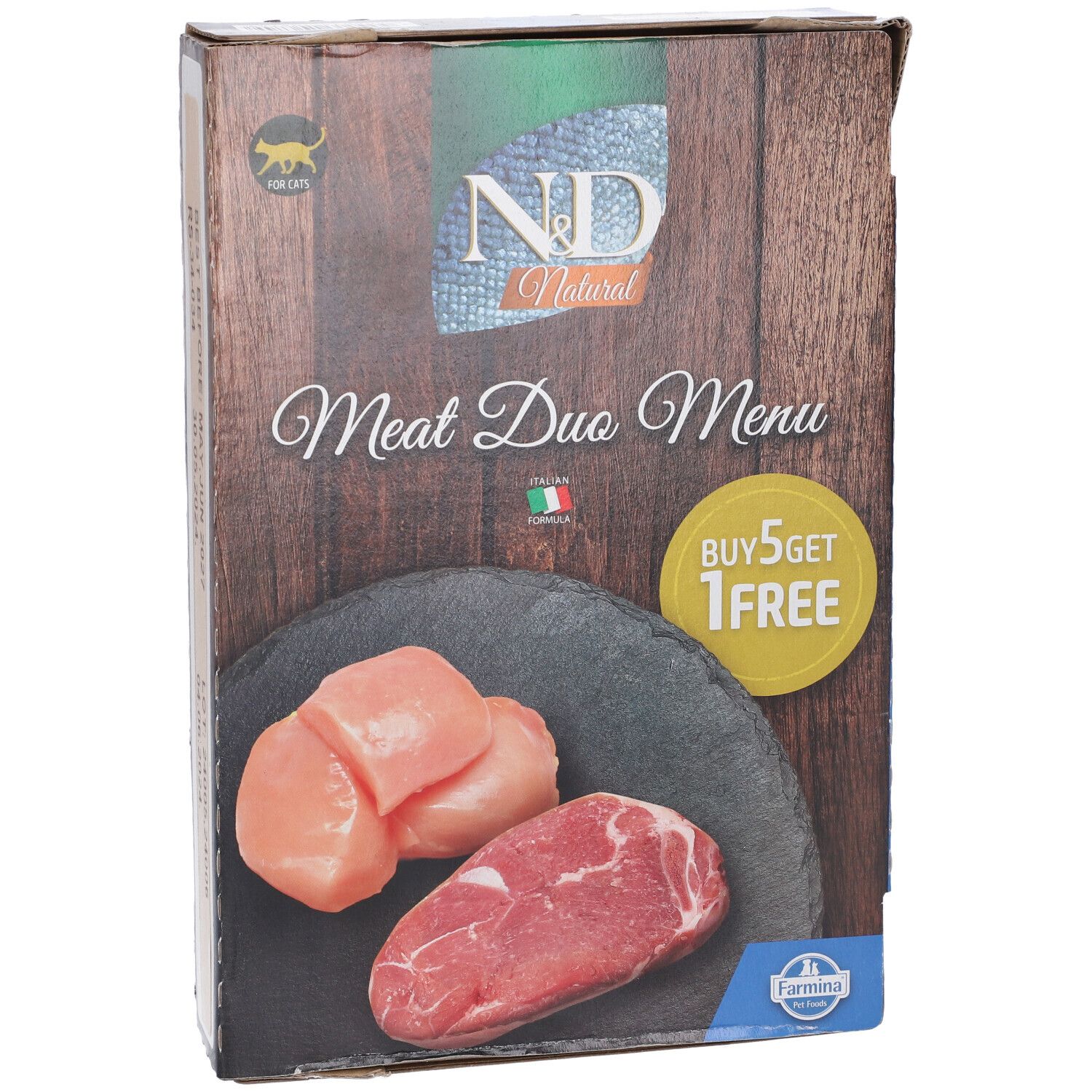 Scatola con immagine del prodotto: pezzi di carne su ardesia. Testo: Meat Duo Menu, Buy 5 Get 1 Free. Logo: Farmina.