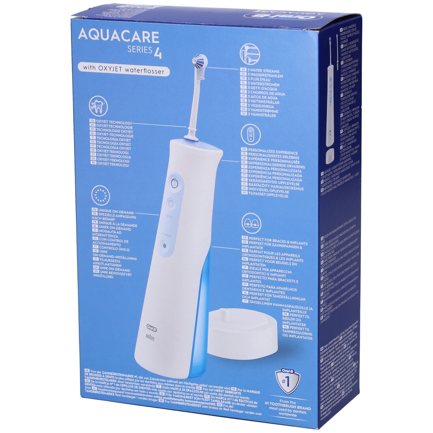 Oral-B Aquacare 4. Confezione con idropulsore. Apparecchio bianco con dettagli blu. Testo: Tough on plaque, gentle on gums.